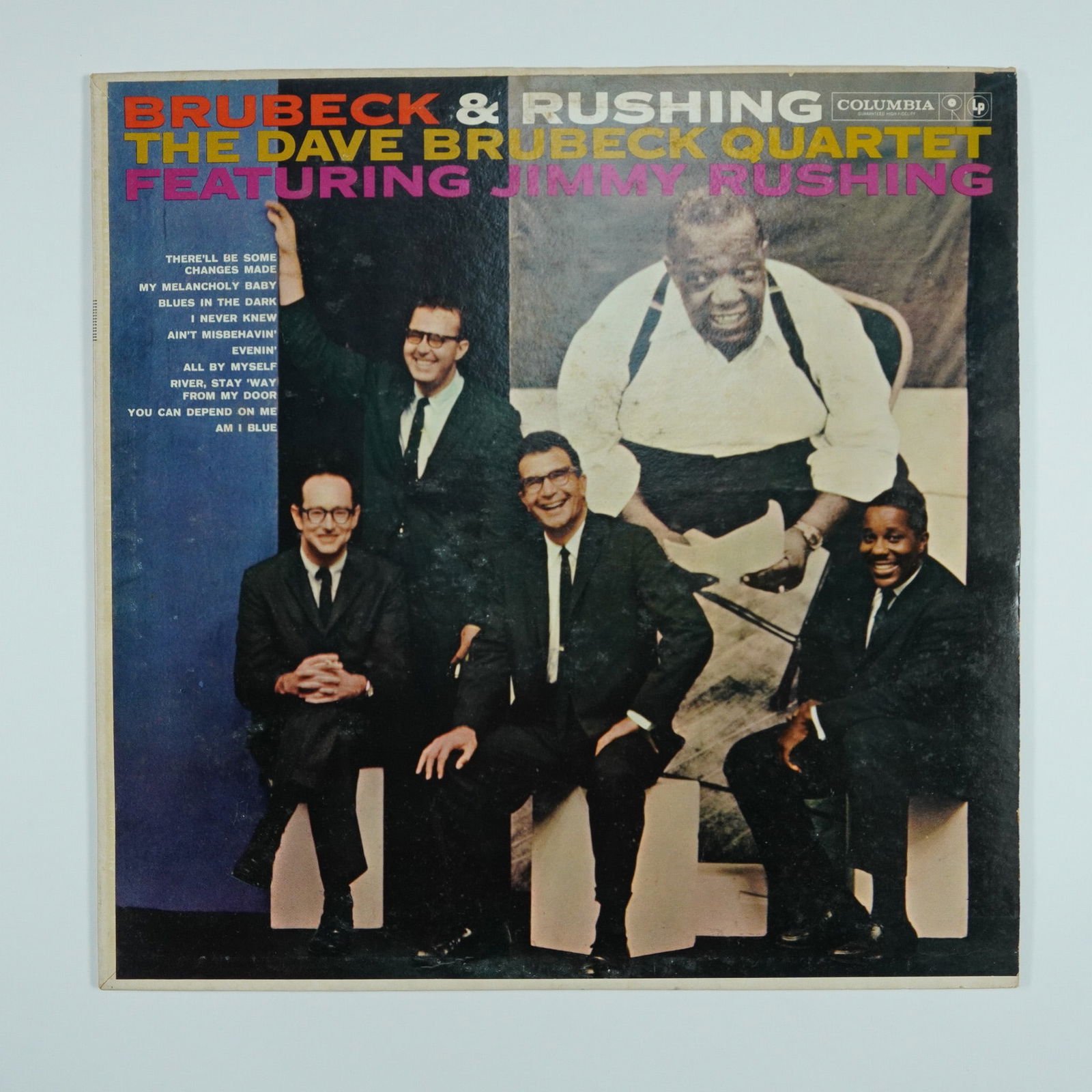 The Dave Brubeck Quartet Vinyl Record, Brubeck and Rushing: This vintage Columbia Records LP, Brubeck and Rushing, features The Dave Brubeck Quartet with renowned jazz and blues vocalist Jimmy Rushing. Released under catalog number CL 1553, this album showcase
