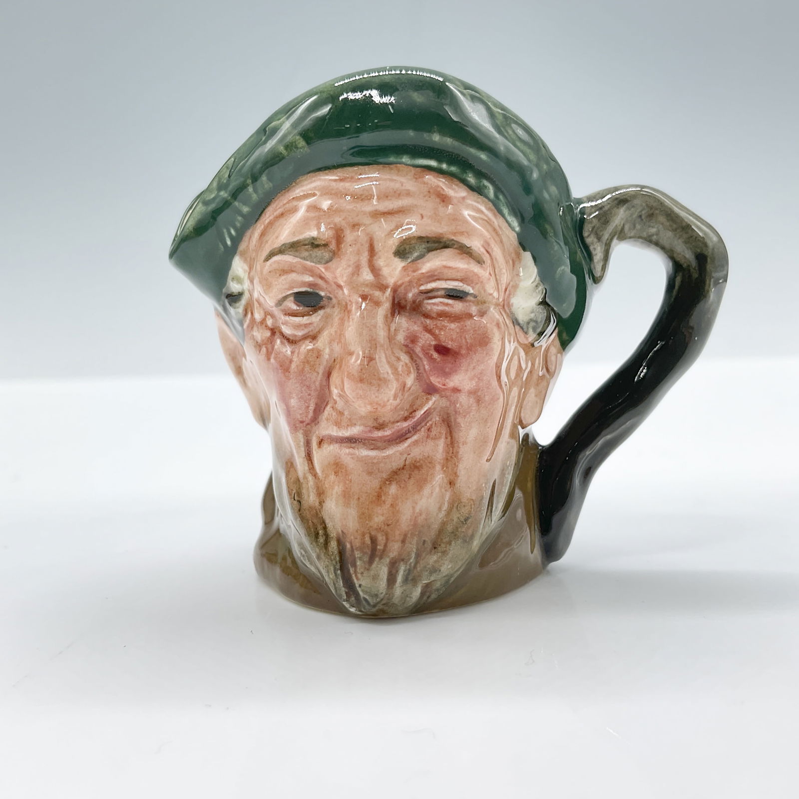 Auld Mac D6253 - Mini - Royal Doulton Character Jug: Royal Doulton backstamp. Artist: Harry Fenton Issued: 1946 - 1985 Dimensions: 2.25"H Country of Origin: England