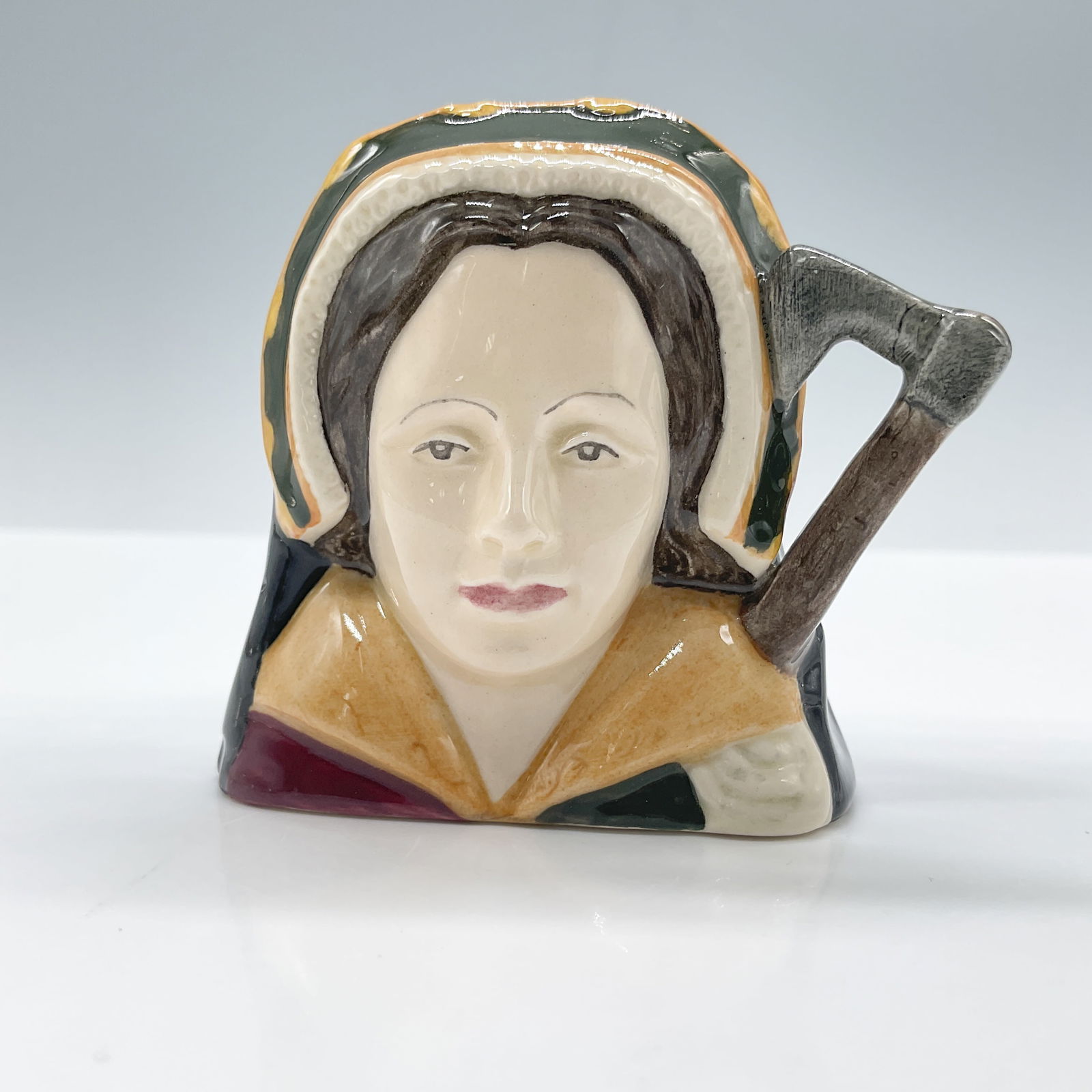 Catherine Howard D6693 - Mini - Royal Doulton Character Jug: Royal Doulton backstamp. Artist: Peter Gee Issued: 1984 - 1989 Dimensions: 2.5"H Country of Origin: England