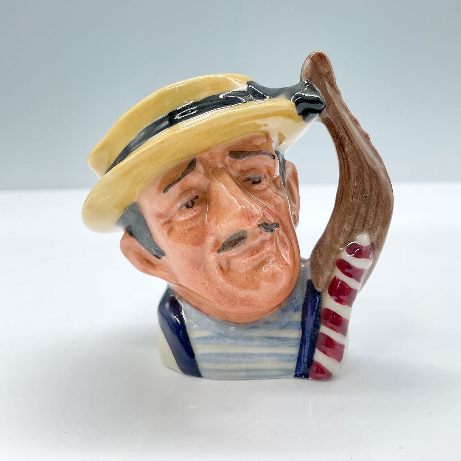 Gondolier D6595 - Mini - Royal Doulton Character Jug: Royal Doulton backstamp. Artist: David B. Biggs Issued: 1964 - 1969 Dimensions: 2.5"H Country of Origin: England