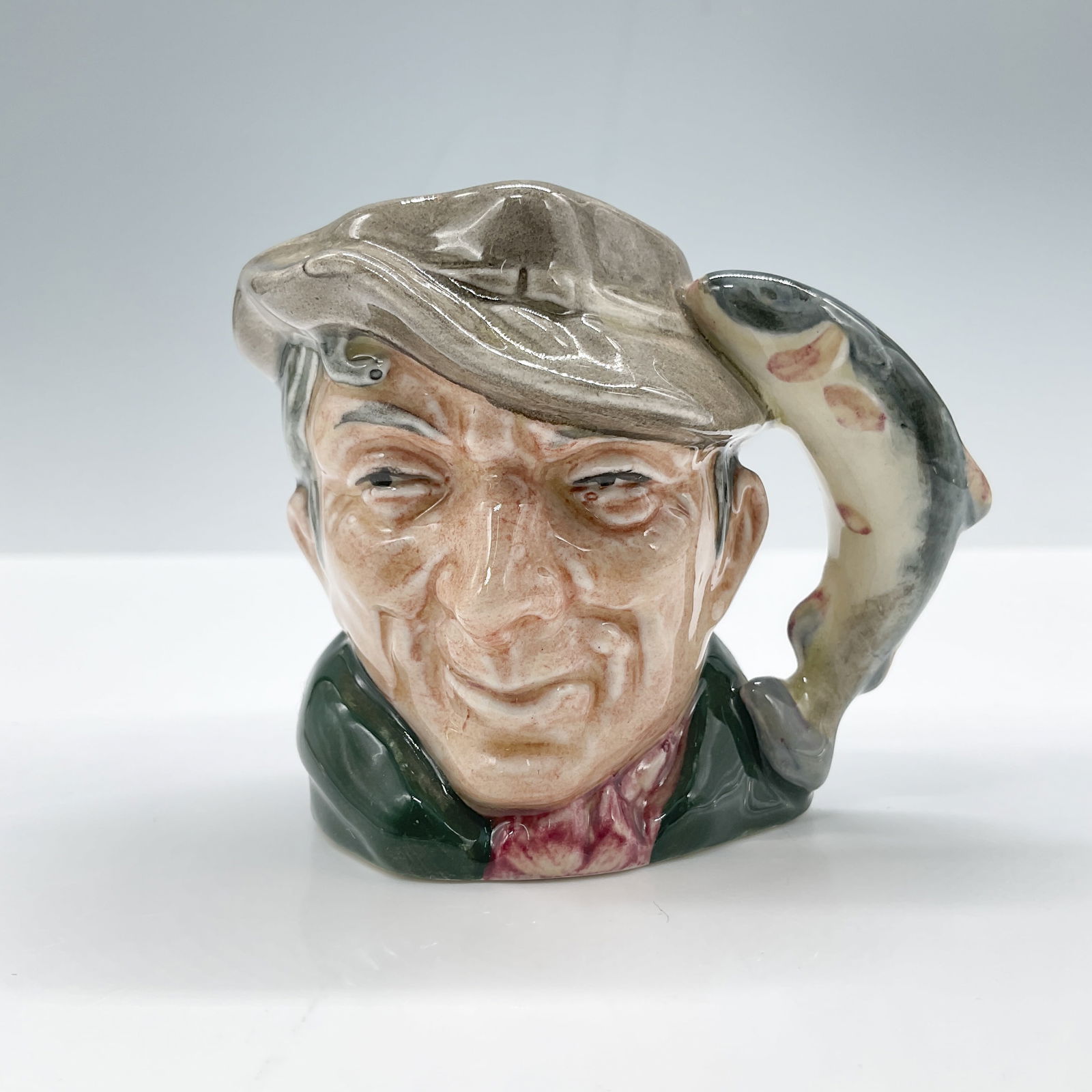 Poacher D6515 - Mini - Royal Doulton Character Jug: Royal Doulton backstamp. Artist: Max Henk Issued: 1960 - 1991 Dimensions: 2.5"H Country of Origin: England
