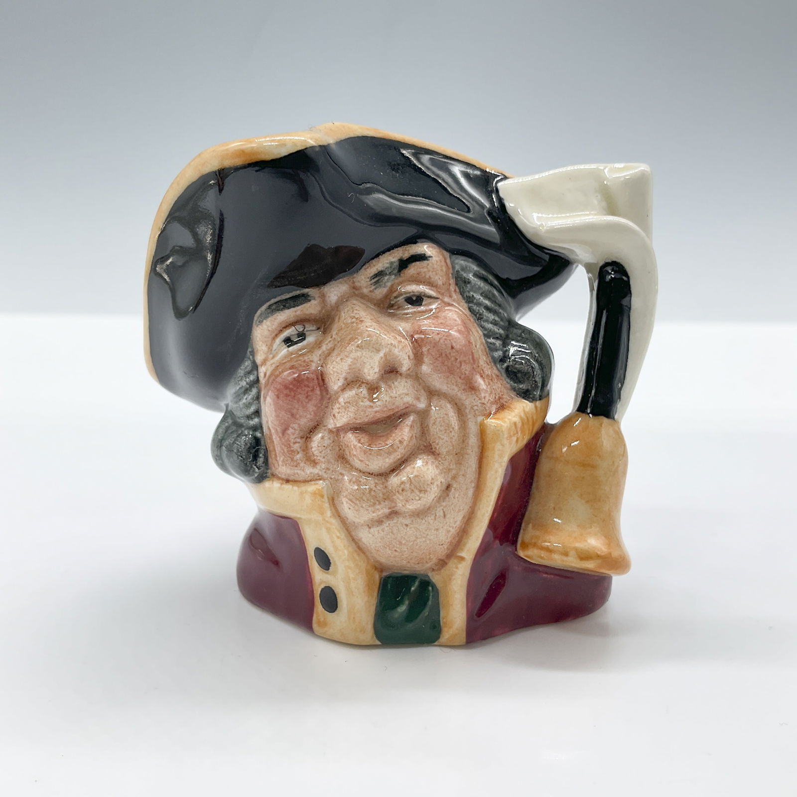 Town Crier D6544 - Mini - Royal Doulton Character Jug: Royal Doulton backstamp. Artist: David B. Biggs Issued: 1960 - 1973 Dimensions: 2.5"H Country of Origin: England