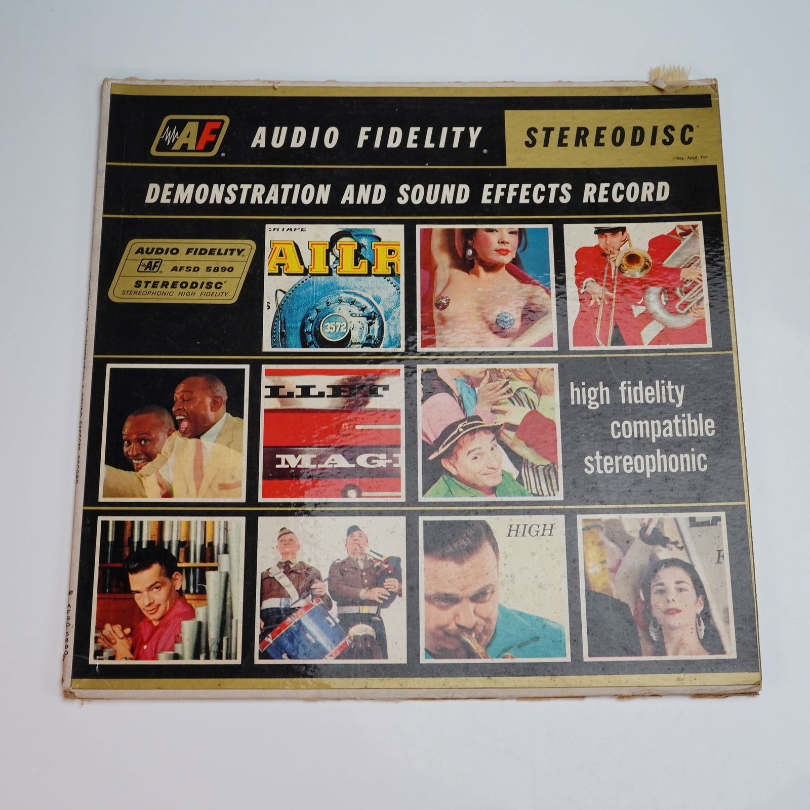 Audio Fidelity Stereodisc Demonstration and Sound Effects Vinyl Record: An Audio Fidelity Stereodisc vinyl record showcasing a compilation of demonstration tracks and stereophonic sound effects, produced as a study in high fidelity sound reproduction. Issued in 1957 by Au