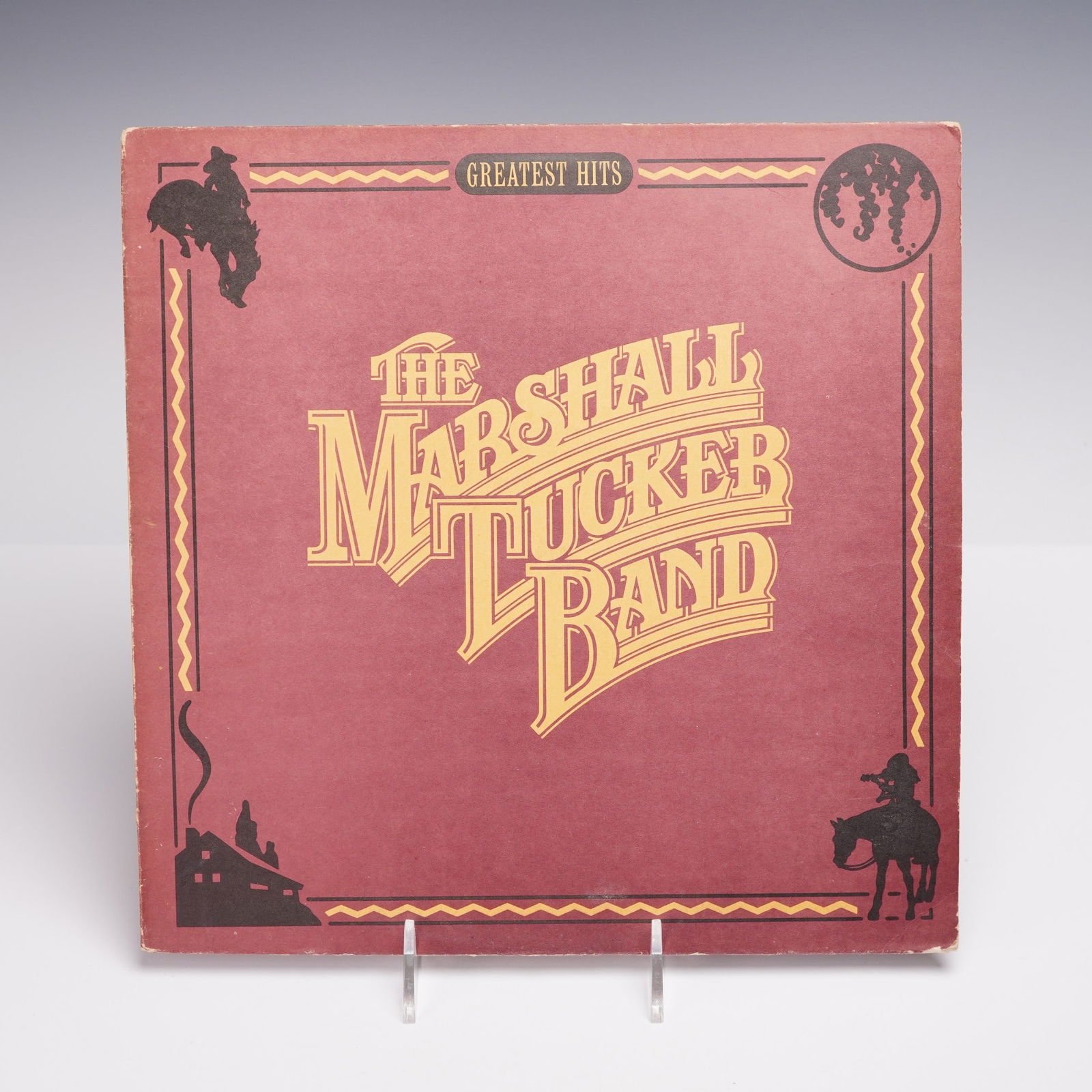 Capricorn Records The Marshall Trucker Band Vinyl Record, Greatest Hits: 12-inch vinyl record titled "Greatest Hits" by The Marshall Tucker Band, released under Capricorn Records. The record features a collection of songs from the band's Southern rock and country rock repe