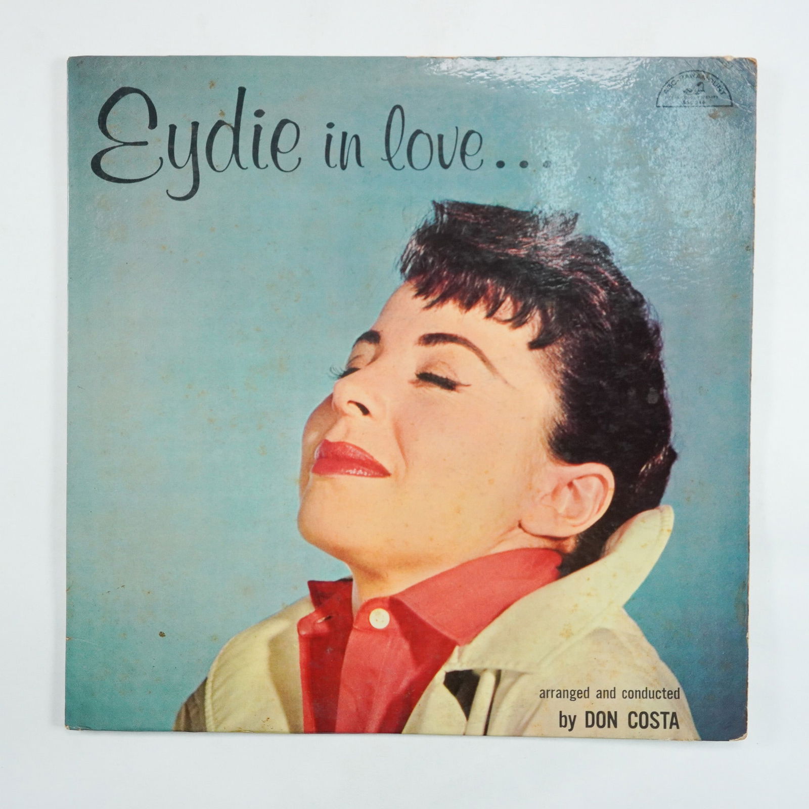 Eydie Gorme, Eydie in Love Vinyl Record: Vintage Eydie in Love vinyl record by Eydie Gorme, released under ABC-Paramount (Catalog No. ABC-246). This album, arranged and conducted by Don Costa, features romantic ballads, including When the Wo