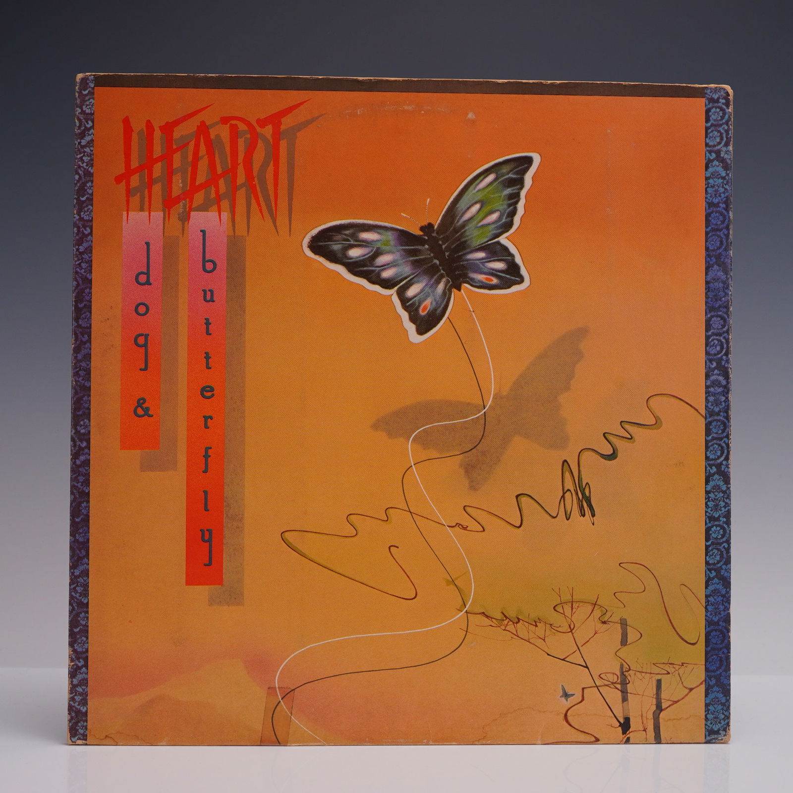 Heart LP Record - Dog & Butterfly Vinyl, 1978: Heart Dog & Butterfly, original 1978 Portrait Records pressing (AL 35555), featuring the custom illustrated label and gatefold sleeve. The album is structured in two thematic halves - Dog (rock) and B