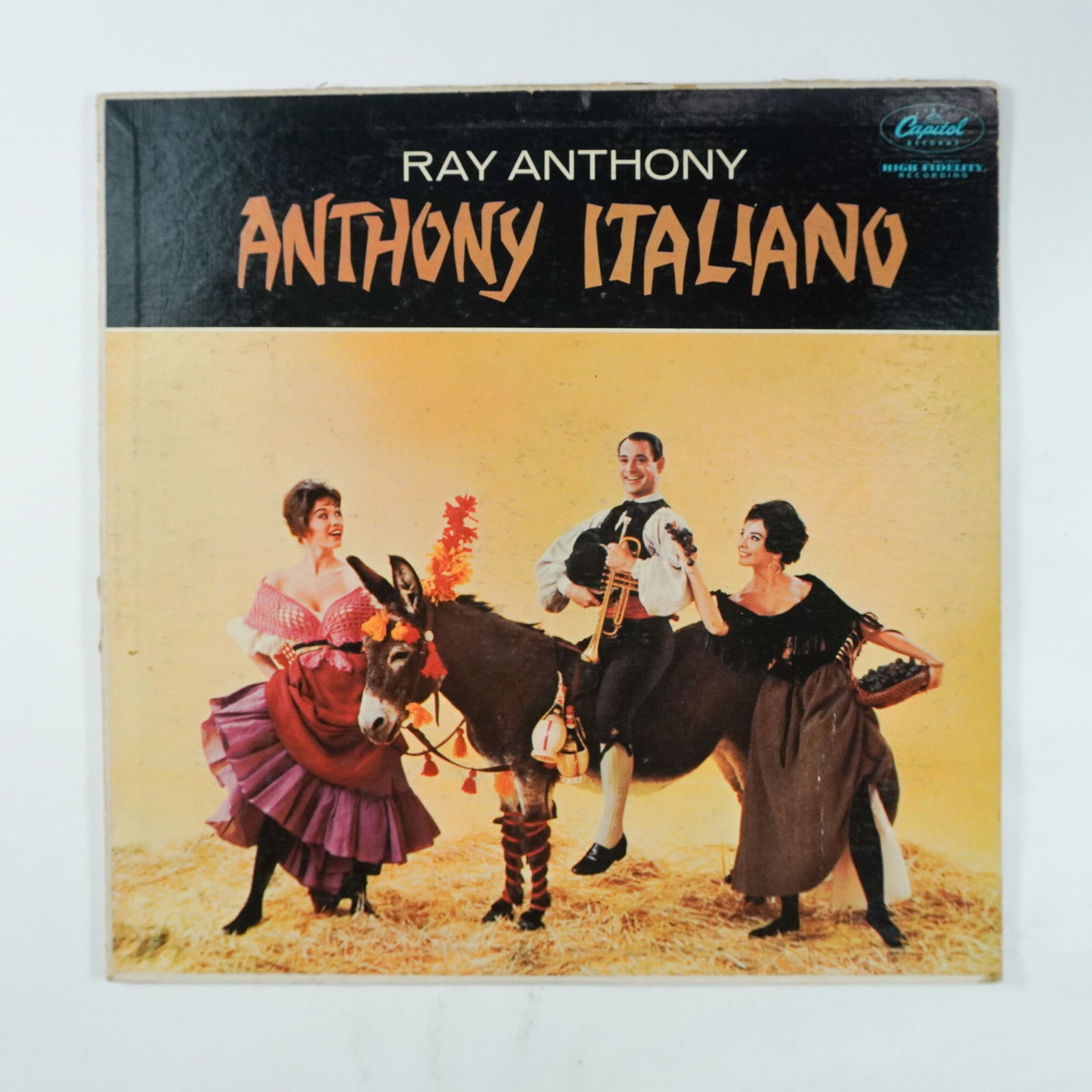 Ray Anthony Anthony Italiano Vinyl LP Capitol Records T149: Vintage vinyl LP Anthony Italiano by Ray Anthony and His Orchestra, released under Capitol Records, catalog number T149. Featuring a blend of Mediterranean-inspired danceable favorites, this album sho