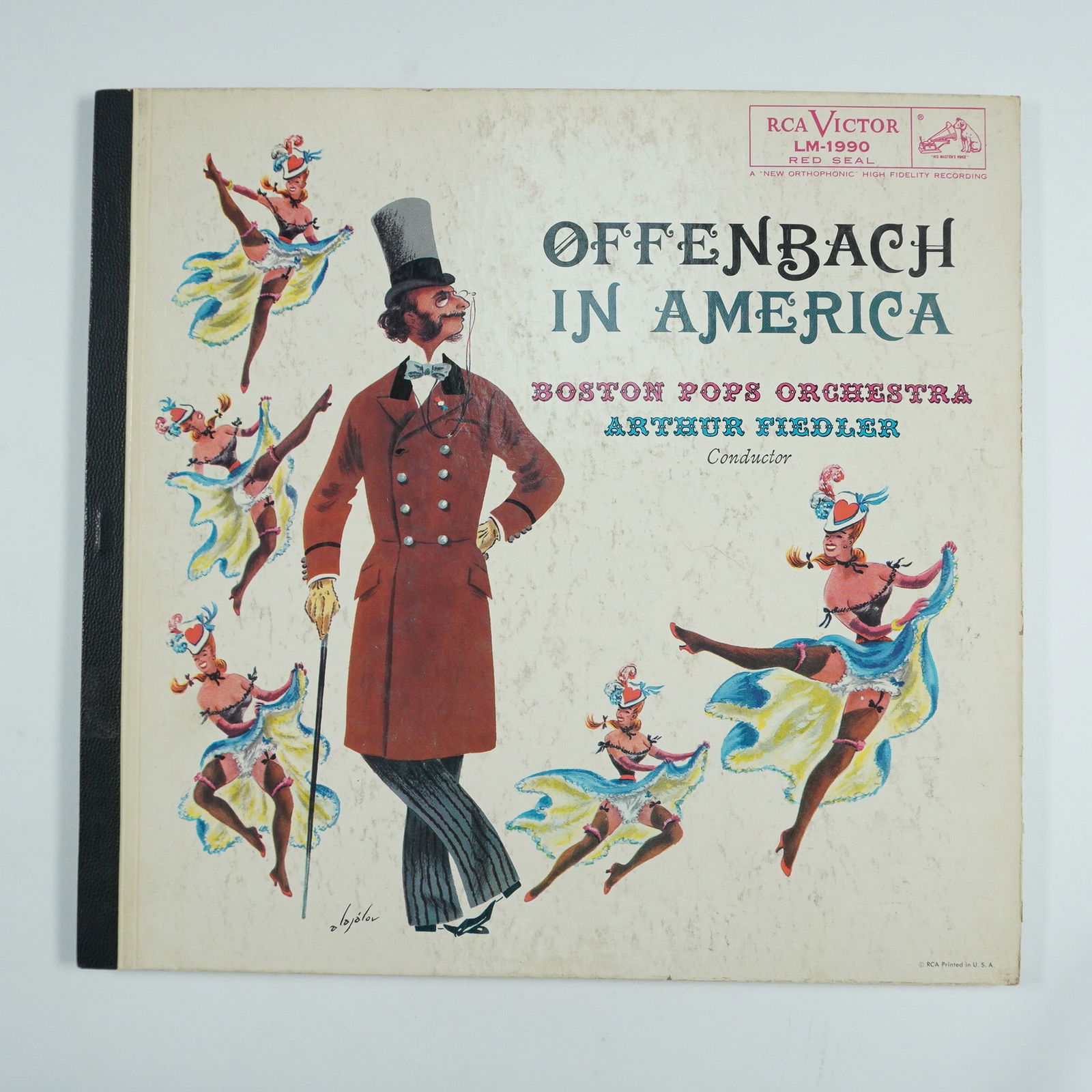 RCA Victor Vinyl Record, Offenbach in America: This vintage RCA Victor "Offenbach in America" vinyl record features the Boston Pops Orchestra conducted by Arthur Fiedler, delivering a lively interpretation of Offenbach's compositions. Released as