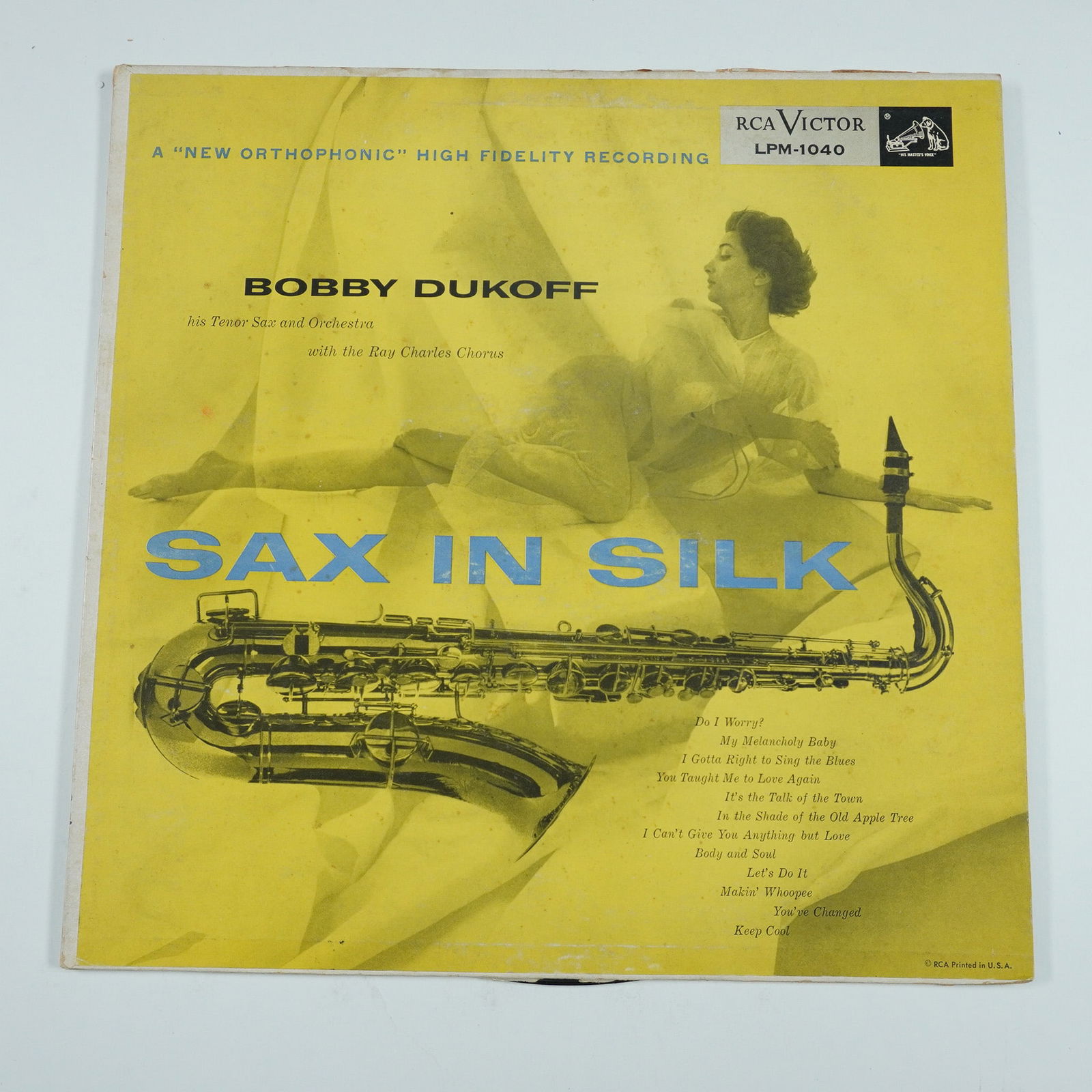 RCA Victor, Vinyl Record, Sax in Silk by Bobby Dukoff: This is a vintage RCA Victor vinyl record titled Sax in Silk by Bobby Dukoff, featuring his tenor sax and orchestra with the Ray Charles Chorus. Released under catalog number LPM-1040, this high-fidel