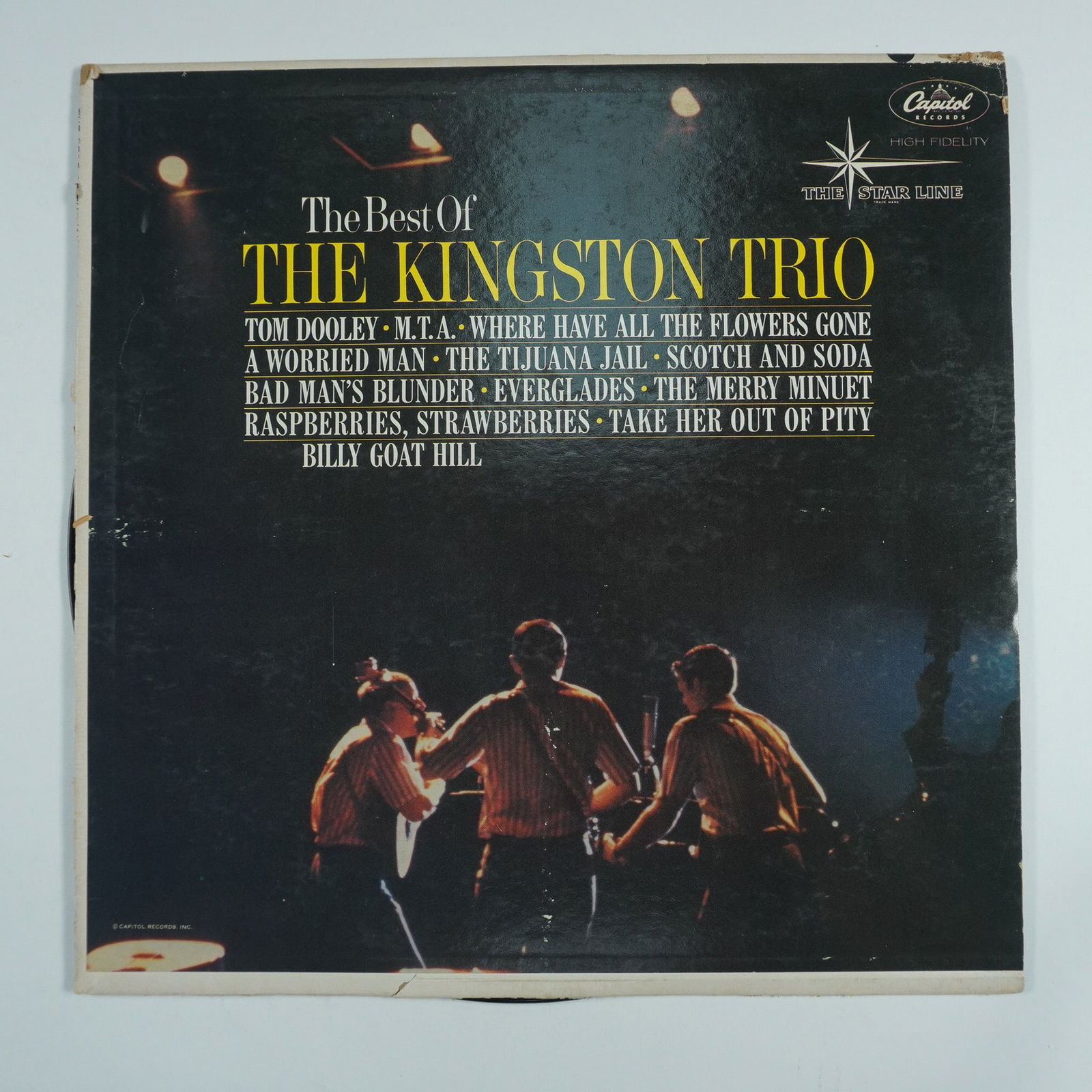The Best of the Kingston Trio Vinyl Record: A vintage vinyl record featuring The Best of the Kingston Trio released under Capitol Records The Star Line series. This compilation album showcases some of the most popular hits from the folk music g