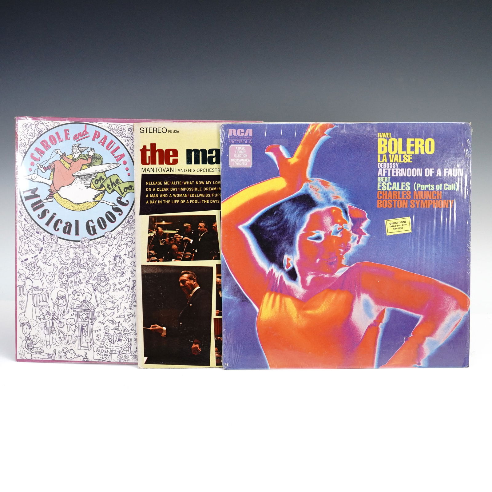 3pc Vinyl LP Records Carole & Paula Mantovani, Boston Symphony & Goose: A set of three vintage vinyl LP records including Carole and Paula's Musical Goose On the Loose, Mantovani and His Orchestra The Mantovani Sound, and Ravel Bolero featuring Charles Munch conducting th