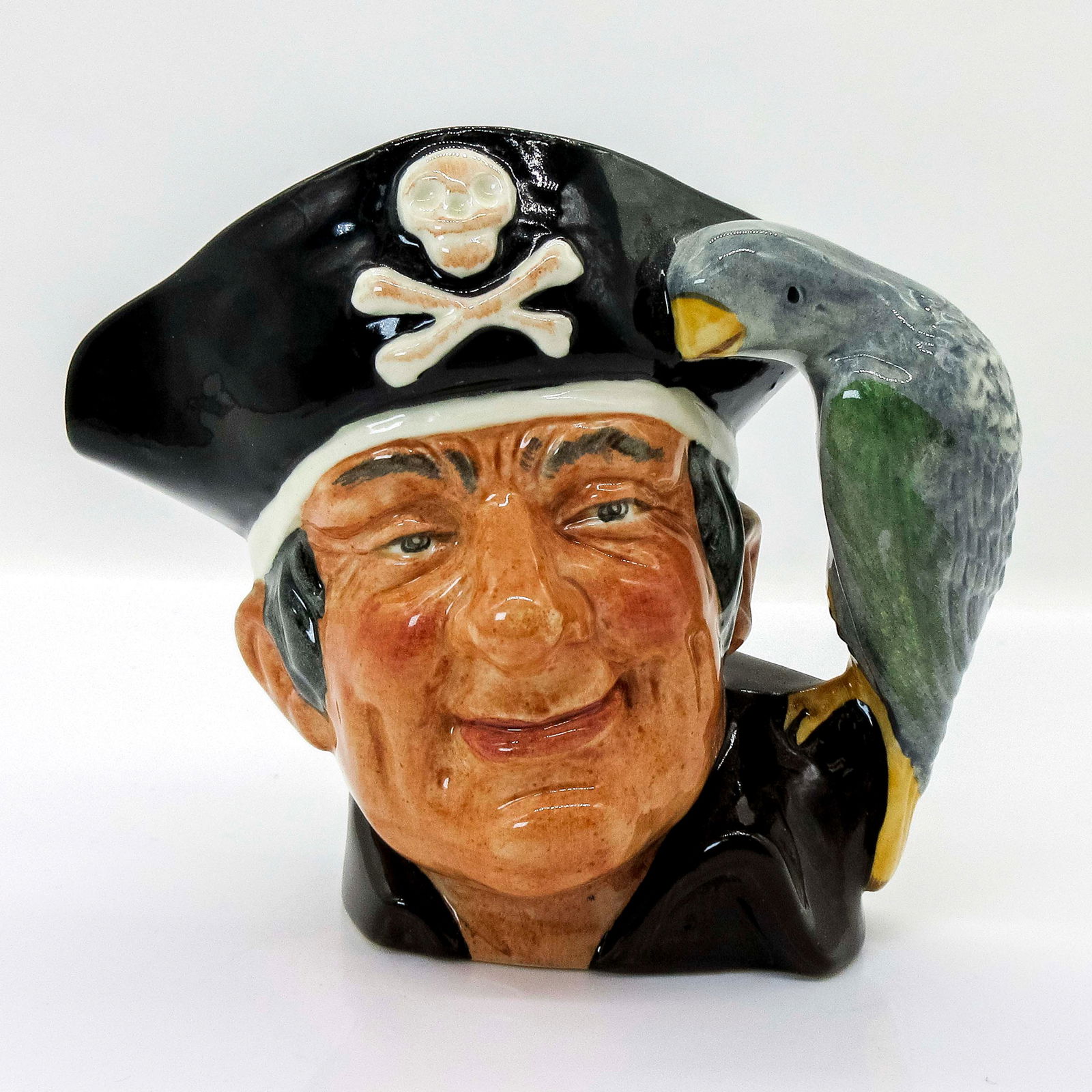 Long John Silver D6386 - Small - Royal Doulton Character Jug: Variation One. Maroon shirt; green and grey parrot. This scoundrel and pirate from Robert Louis Stevenson's " Treasure Island" had a wooden leg and a parrot companion. Together with the boy-hero Jim H