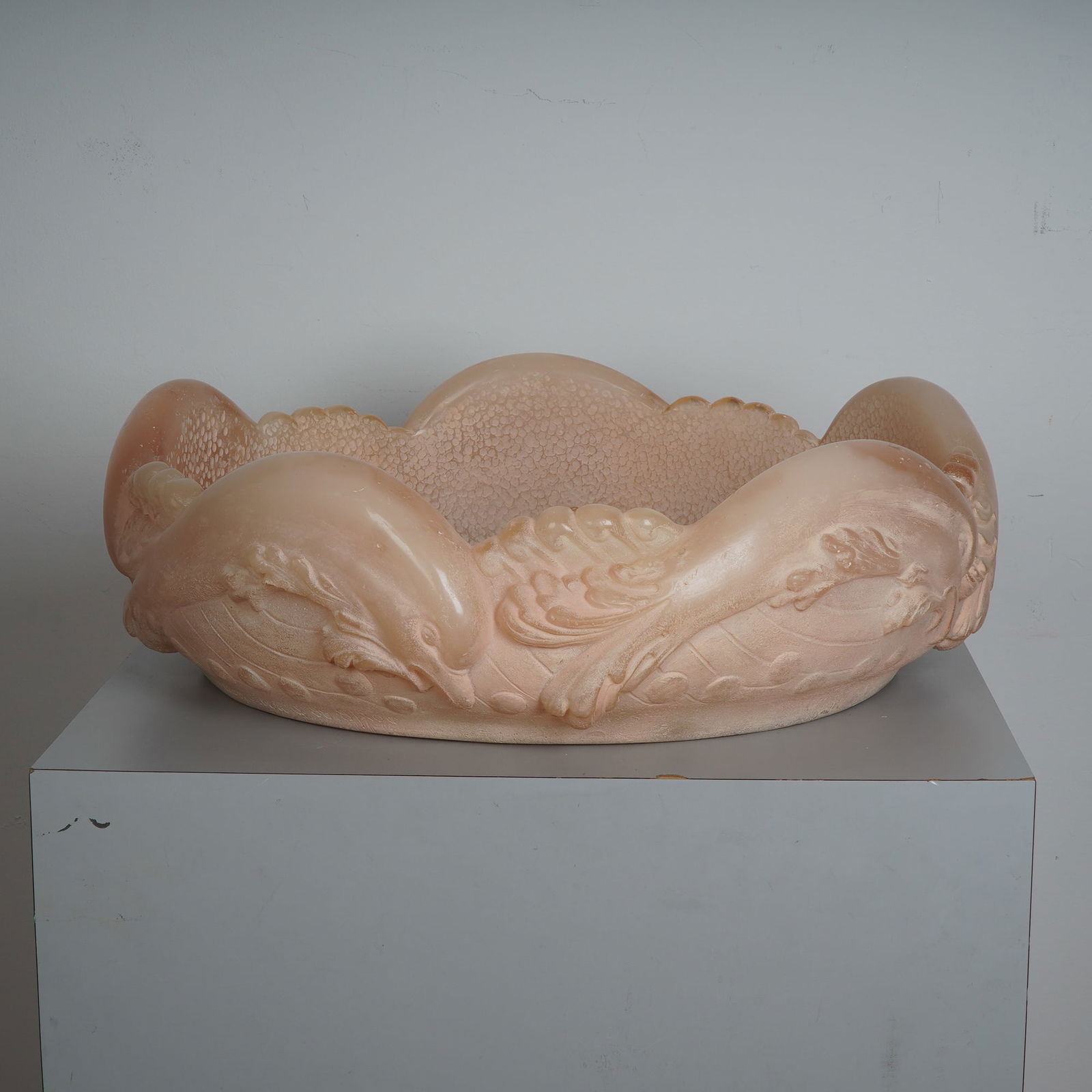 Alan Albert Signed Limited Edition Cast Resin Decorative Bowl: An impressive limited edition cast resin centerpiece bowl by American artist Alan Albert, dated 1988 and numbered 10/200. This sculptural work is rendered in a translucent peach-toned resin with a sof