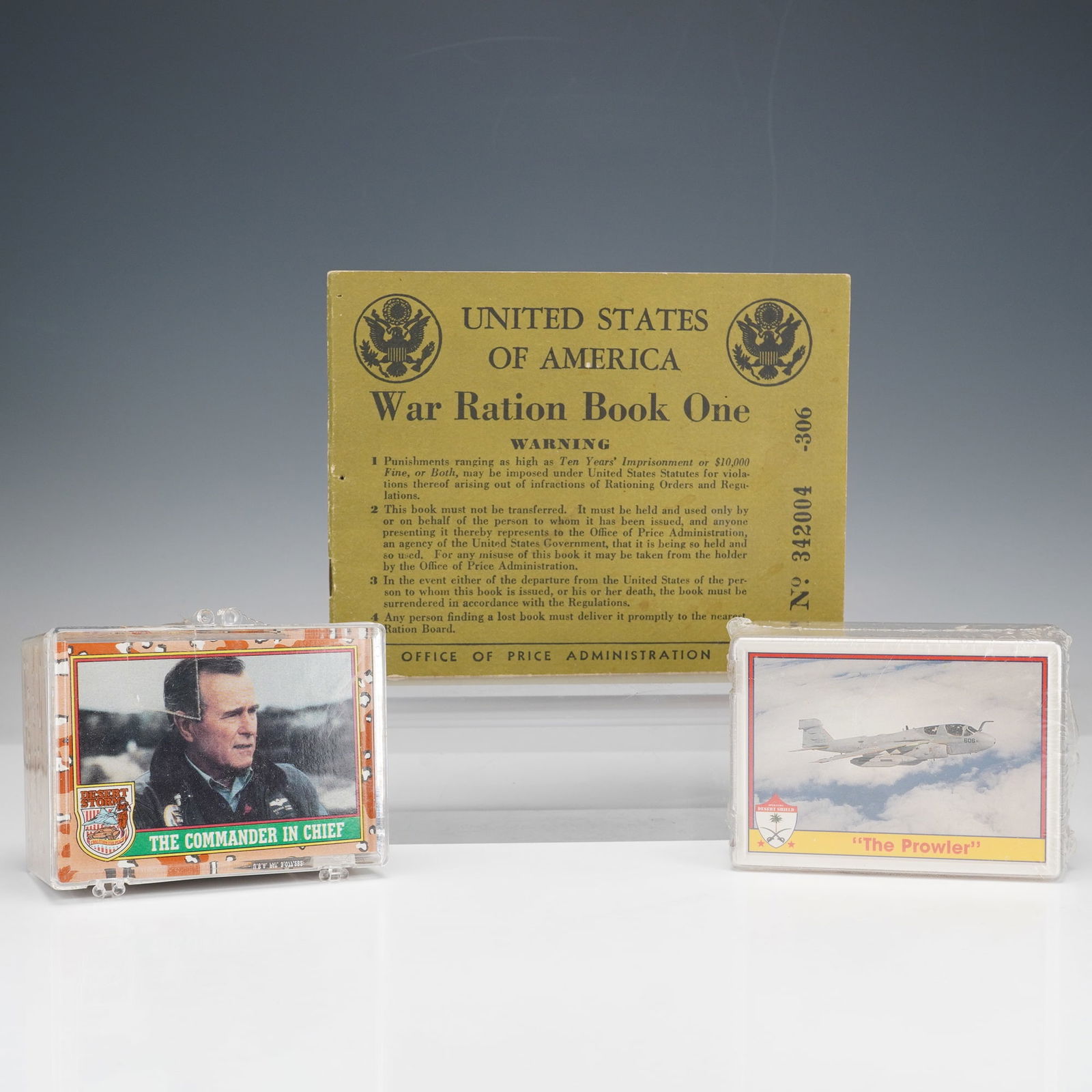3pc Tops, Pacific Trading Cards, & U.S Gov Trading Cards & Ration Book: An evocative trio of mid-century and modern American ephemera comprising a 1943 U.S. Office of Price Administration War Ration Book One, issued during World War II for civilian food and goods distribu