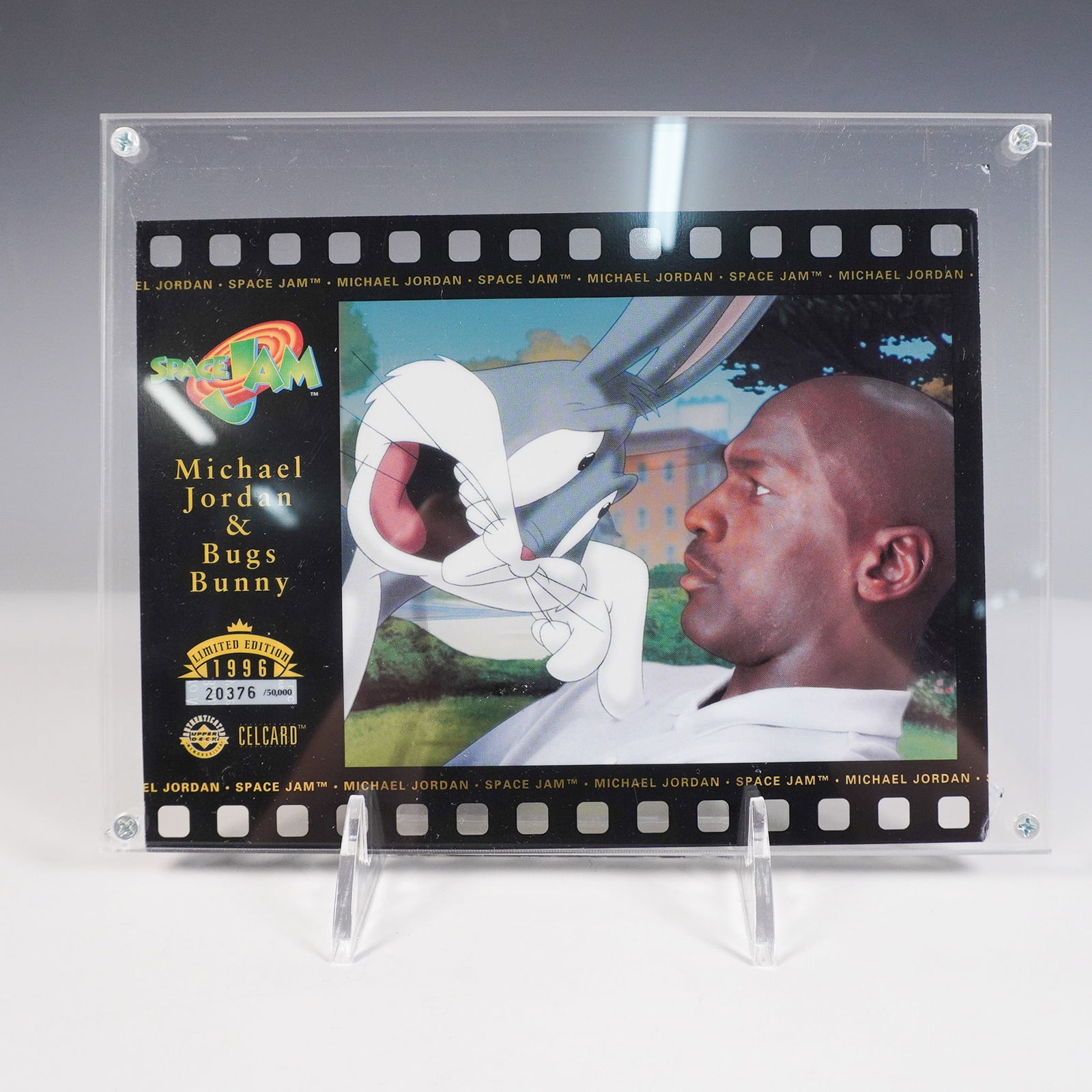 Upper Deck Memorabilia Celcard, Space Jam - Michael Jordan & Bugs Bunny: Upper Deck Space Jam Celcard featuring Michael Jordan and Bugs Bunny, released in 1996. This limited edition collectible was produced by The Upper Deck Company and authorized by Warner Bros. It is num