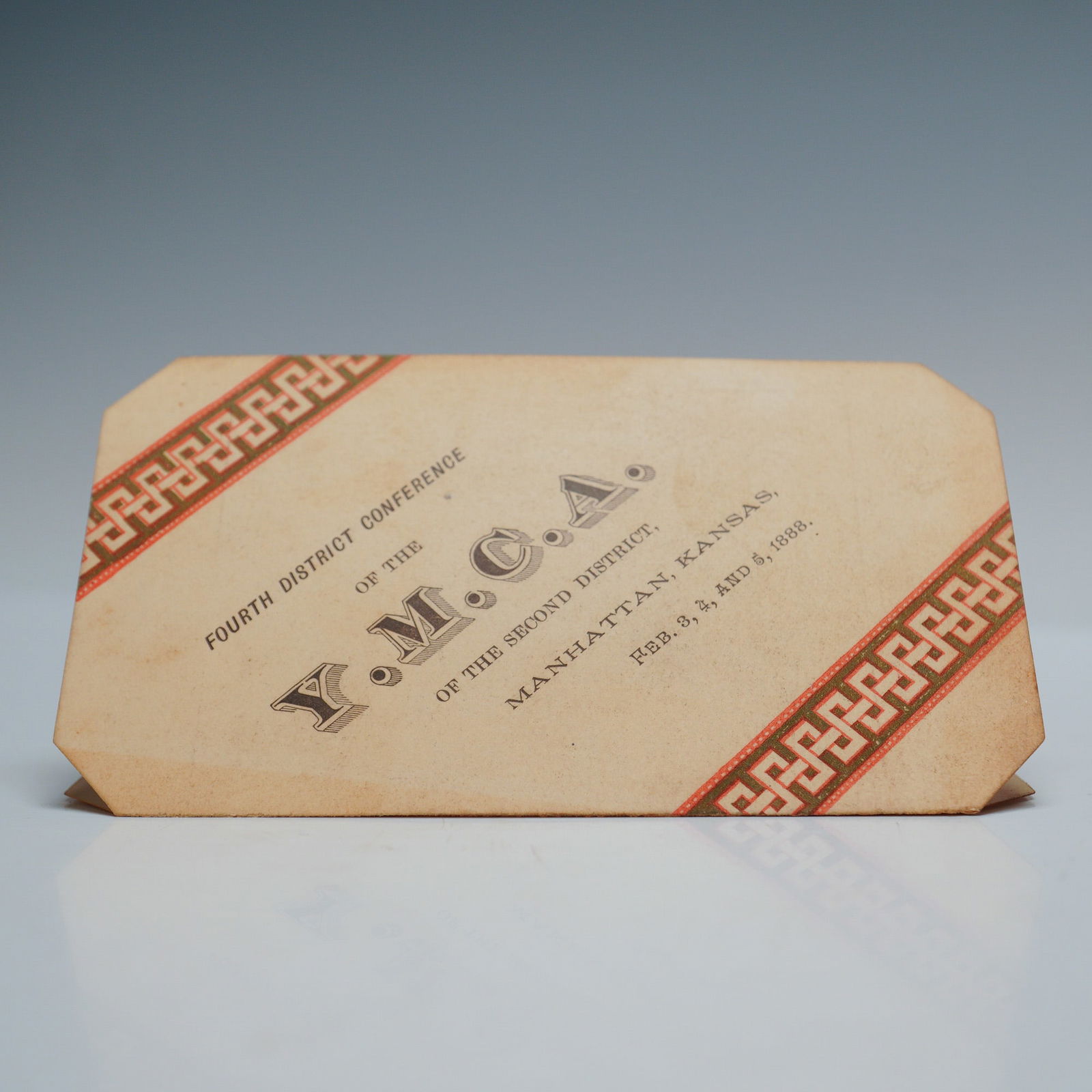 Antique YMCA Conference Program, 4th District of Second District: This is an antique program from the Foutrh District Conference of the YMCA of the Second District, held in Manhattan, Kansas, on February 3-5, 1888. The program features detailed information about the