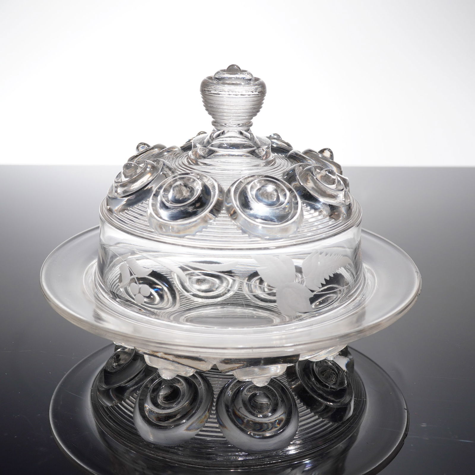 EAPG Eyewinker Clear Glass Covered Dish: An Early American pattern glass covered dish in the highly recognized "Eyewinker" pattern. This early American pattern glass dish with lid consists of a circular base plate and a removable dome cover.