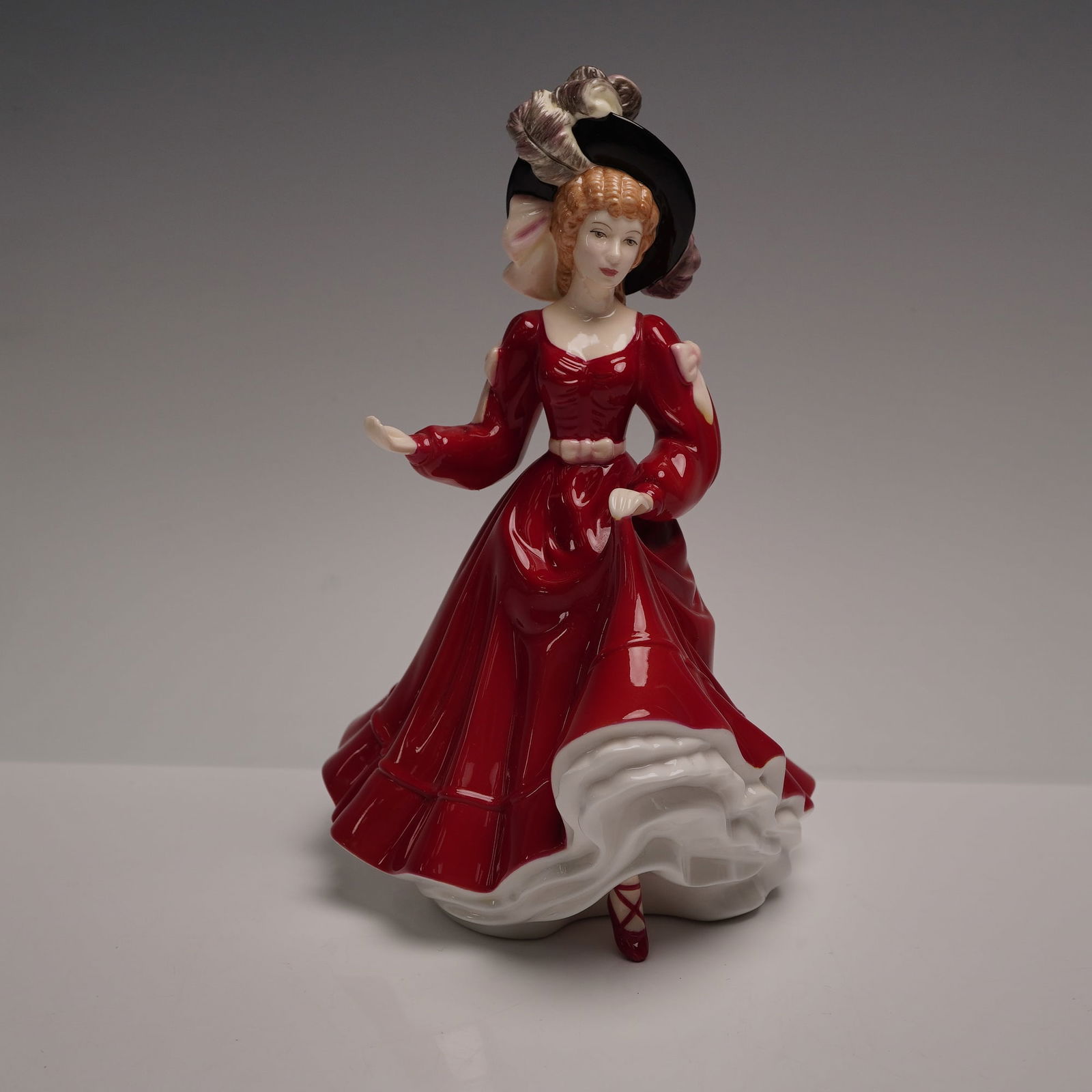 Royal Doulton Petite Figure of the Year 2007, Patricia HN4924: A graceful Royal Doulton Pretty Ladies porcelain figurine titled Patricia, issued as the Petite Figure of the Year for 2007. Designed by Valerie Annand, this elegant hand-decorated bone china figure i