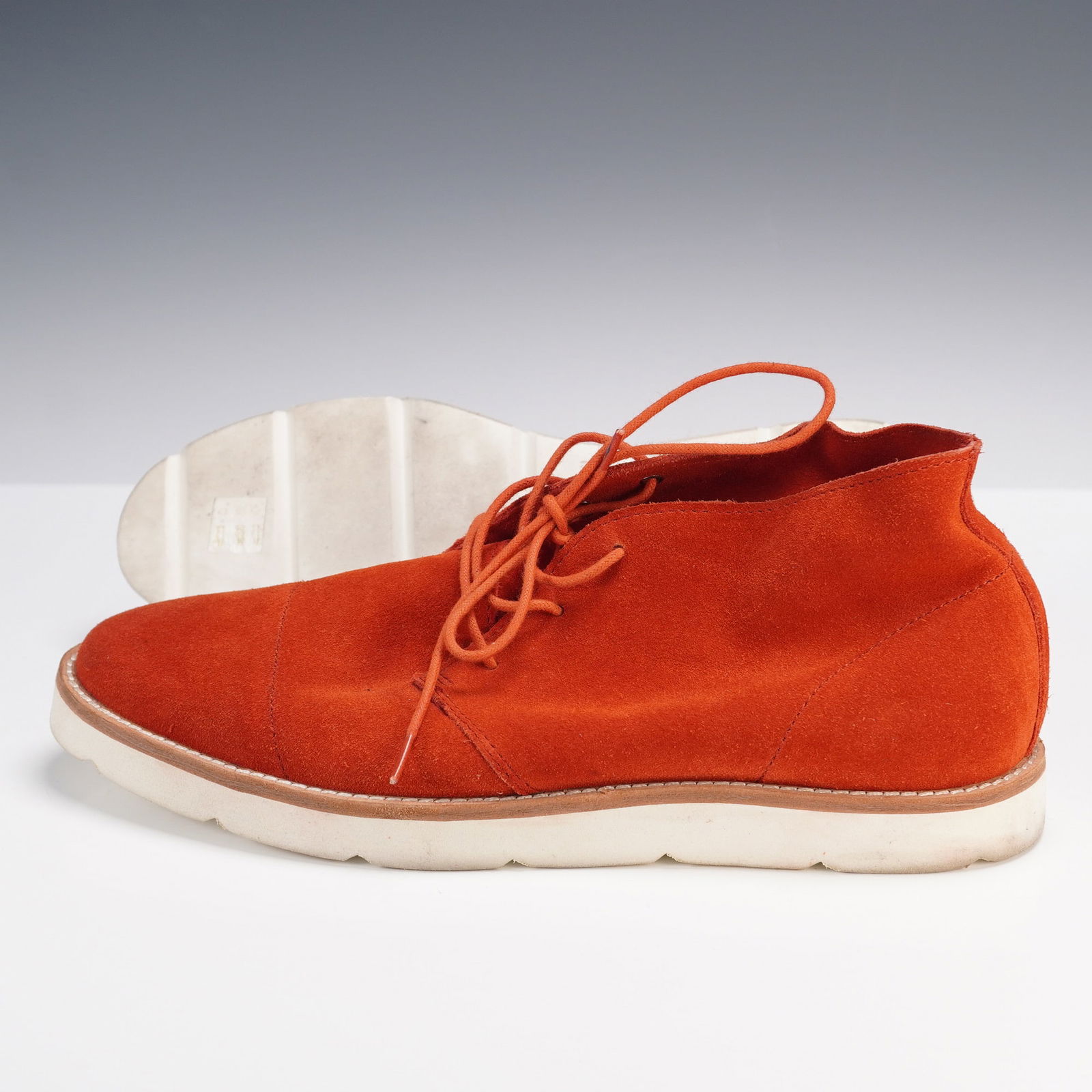 United Nude Terra Cotta Split Suede Desert Shoes: United Nude terra cotta split suede desert shoes with leather lining and white rubber soles, size 41, complete with original box, branded dust bag, and care instructions. Size 41. Box measures 13.5"L