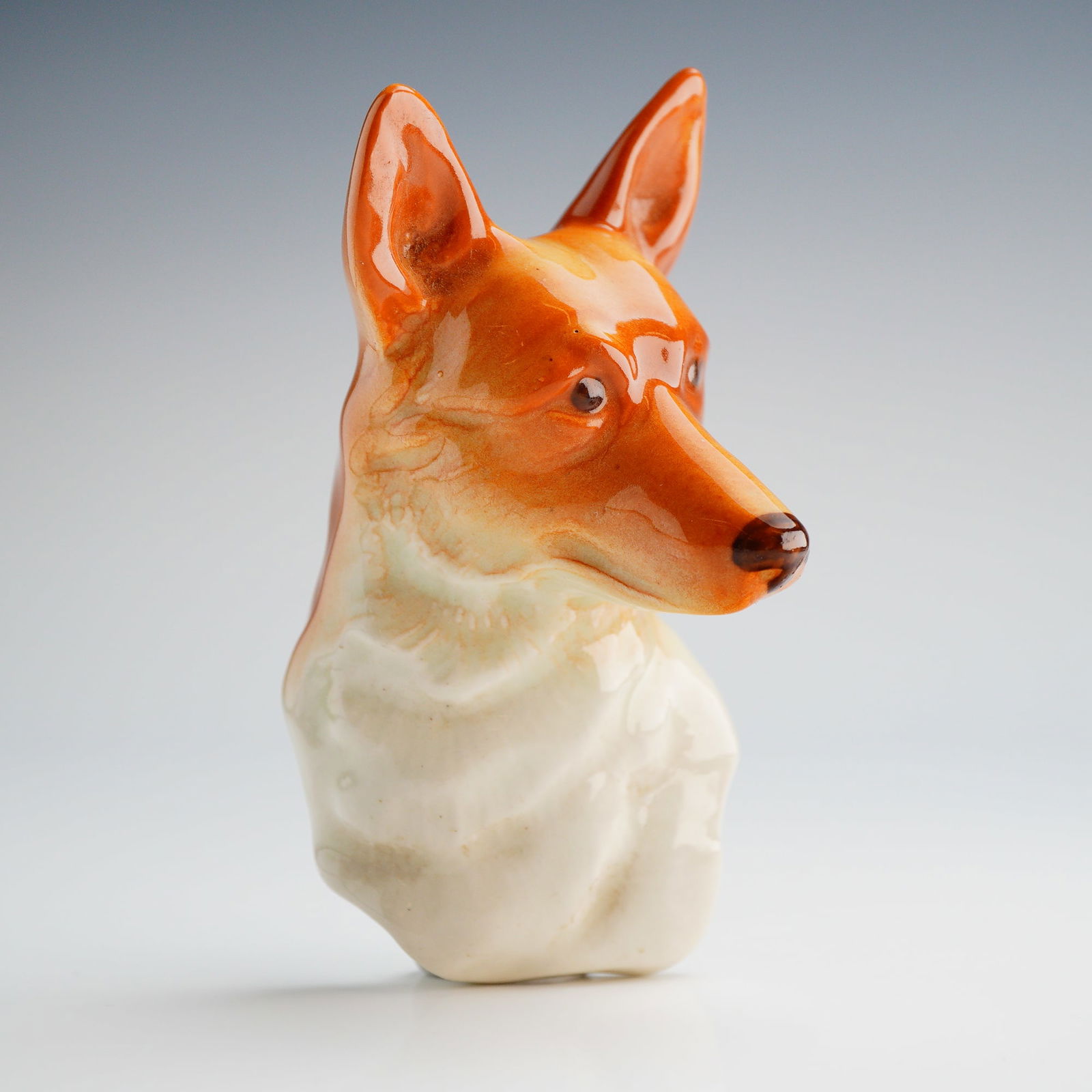 A Glazed Ceramic Wall Plaque Depicting a Dog Head (1 of 5)