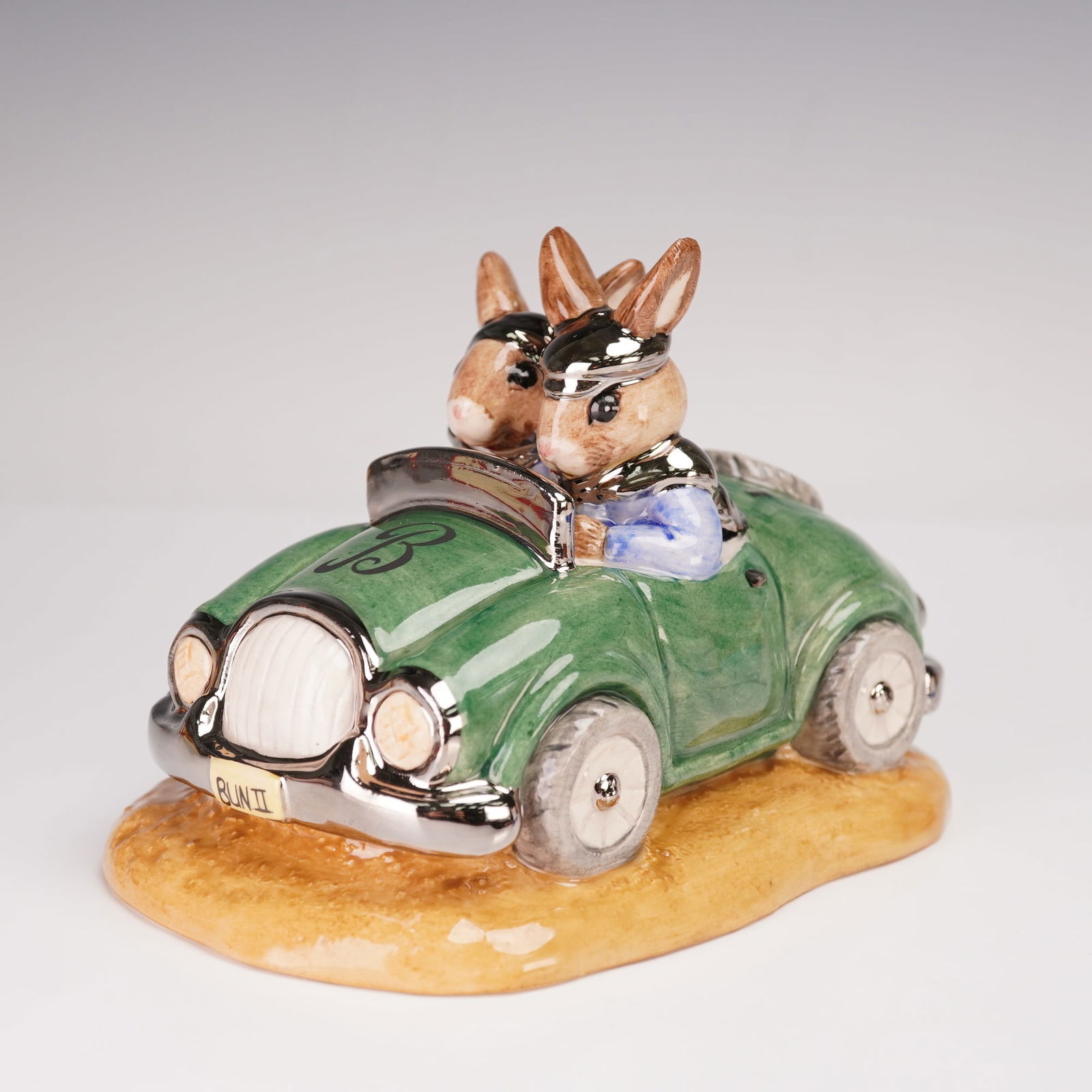 Royal Doulton Platinum Colorway Bunnykins Figurine, Day Trip DB260: A Royal Doulton Bunnykins figurine titled Day Trip, model DB260, issued in a special platinum colorway limited edition of only 50 pieces worldwide. This hand-made, hand-decorated figure depicts two Bu
