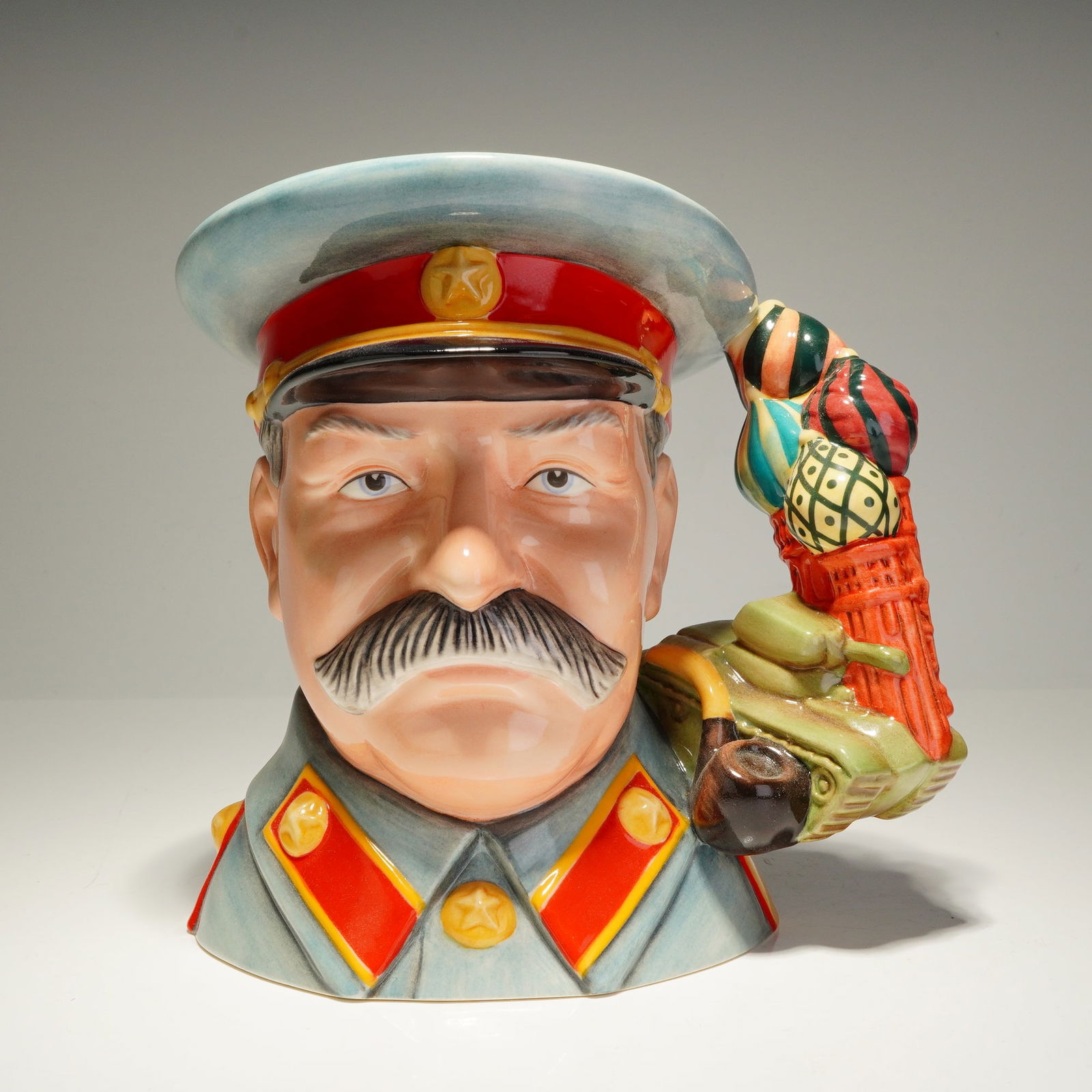 Royal Doulton Large Character Jug, Joseph Stalin D7284: From the World War II Politicians series, this English porcelain character jug is a limited edition, number 22 of 100, portraying Joseph Stalin (1878-1953), the Soviet leader who held near-absolute po