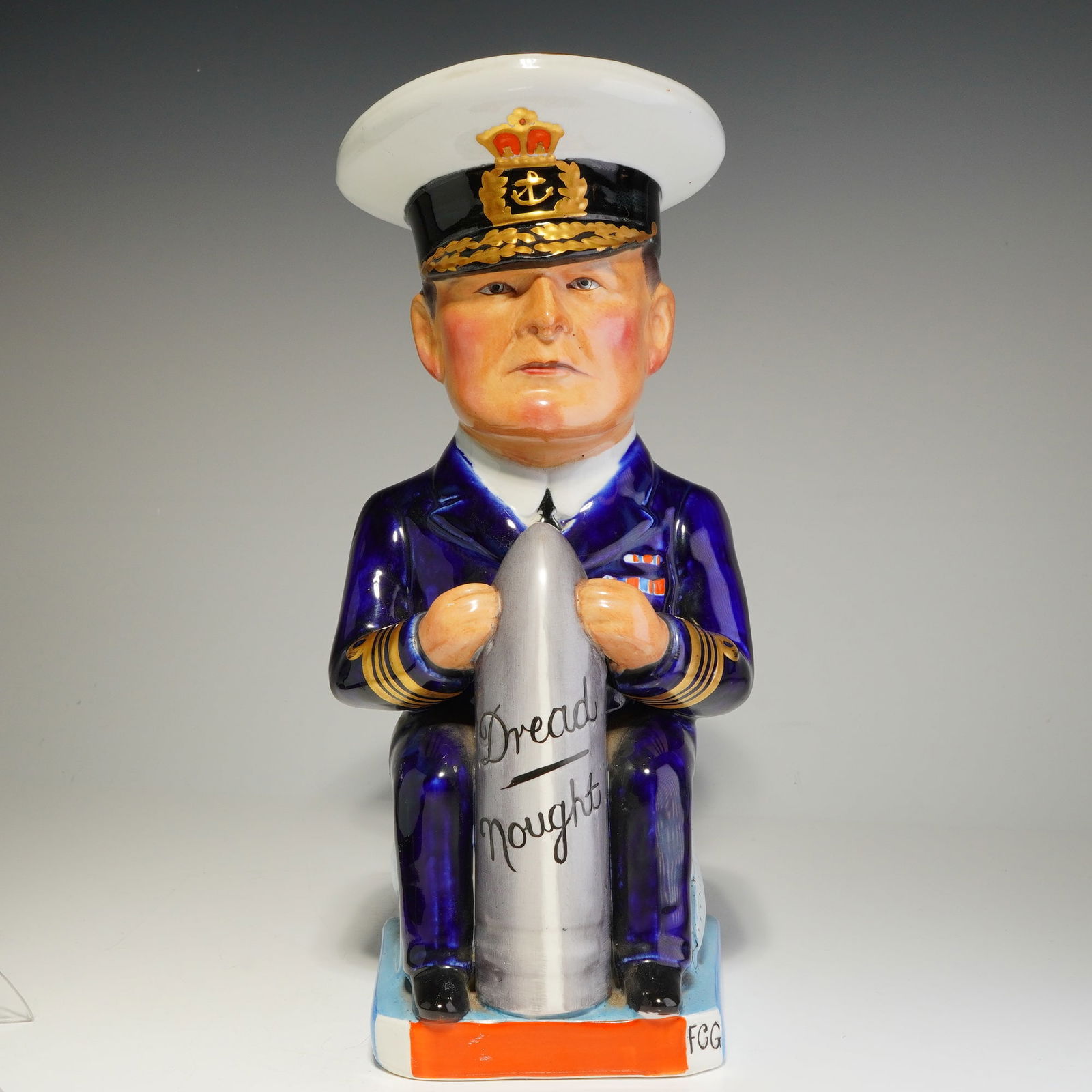 Royal Staffordshire Pottery Wilkinson Toby Jug, Admiral David Beatty: Designed by Carruthers Gould, a glazed earthenware toby jug modeled as Admiral of the Fleet David Beatty, a prominent British naval commander of the First World War. The figural jug is formed in tradi