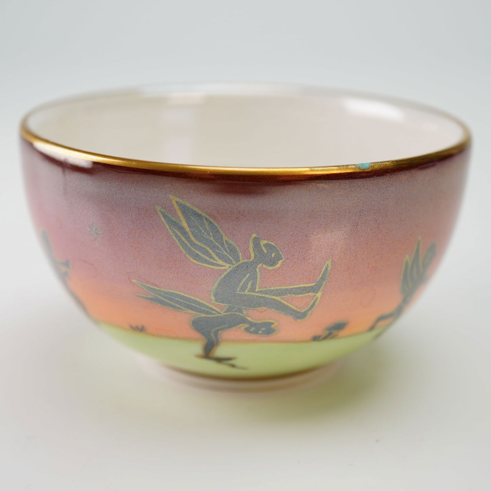 Wedgwood Bone China Fairyland Lustre Bowl, Leapfrogging Elves: Pattern designed by Daisy Makeig-Jones (British, 1881-1945). The interior is finished in high-gloss white and decorated with "Elves on a Branch," with black-painted elves, green branches, and gilt out