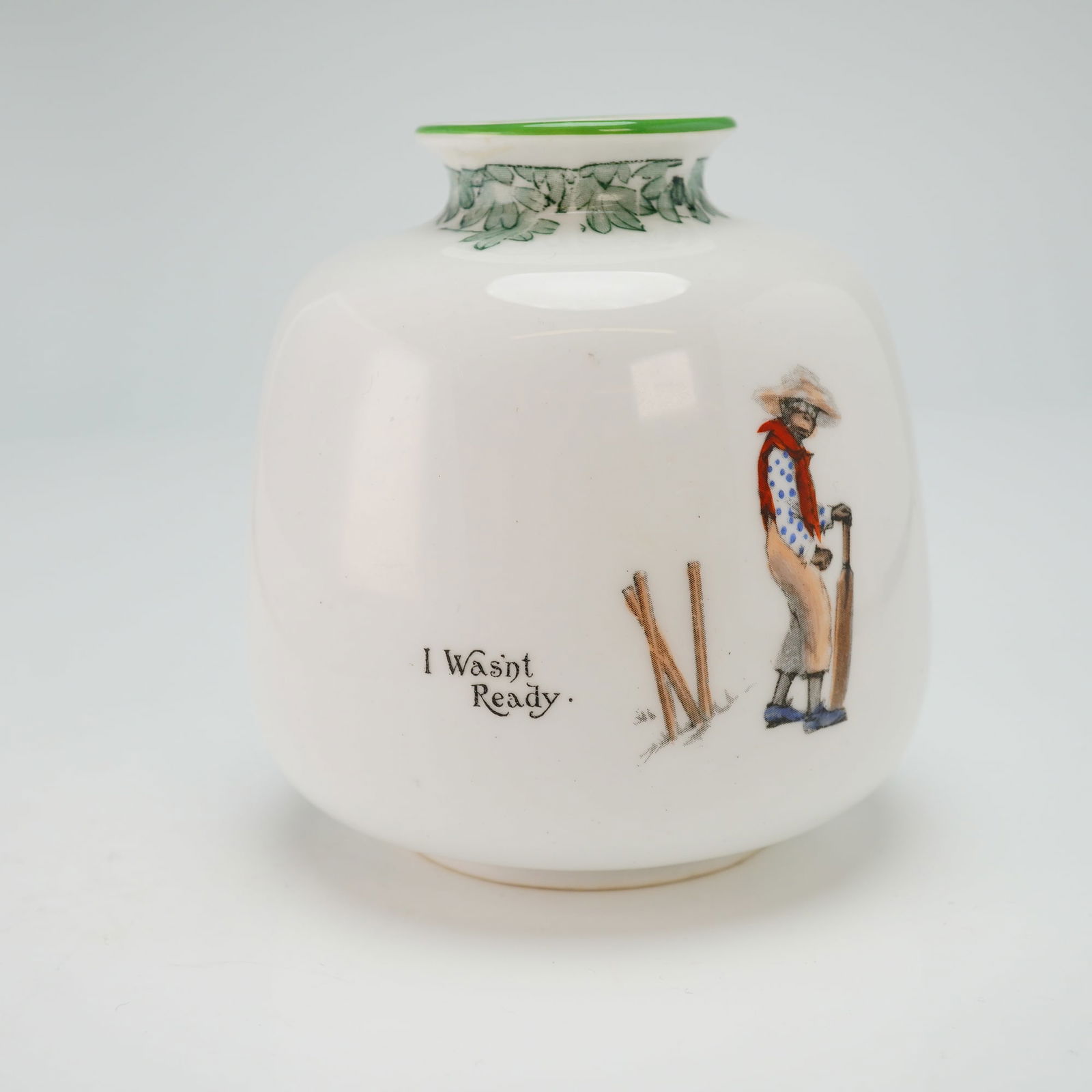 Royal Doulton Series Ware Vase, All Black Team: A bulbous vase from The Cricketers series ware. Depicts a young cricketer accompanied by "I Wasn't Ready" and inscribed "The All Black Team" within a stylized cartouche to the reverse. Royal Doulton b