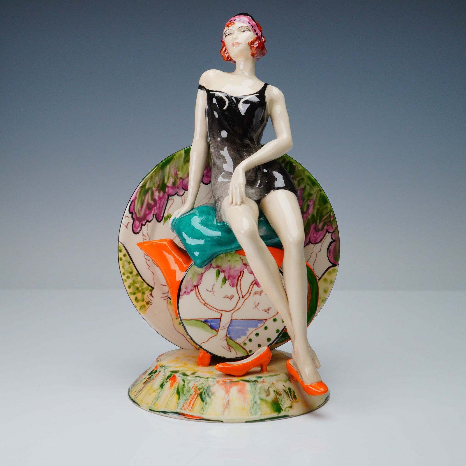 Peggy Davies Figurine, Nostalgia: Striking Peggy Davies ceramic figurine titled Nostalgia, modelled by Andy Moss and hand painted in Staffordshire, England. This bold Art Deco-inspired figure features a glamorous red-haired woman in a