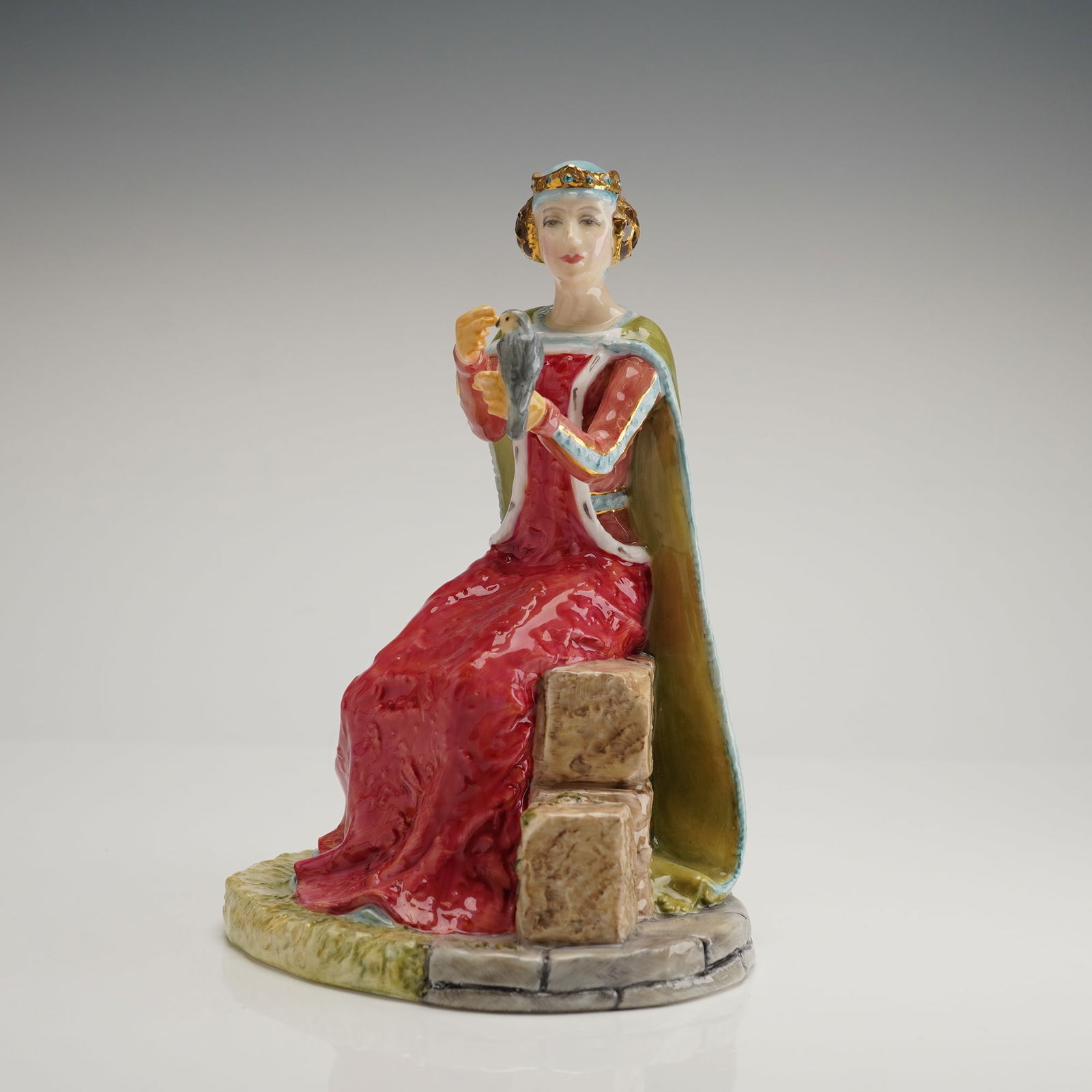 Royal Doulton Figurine Philippa of Hainault HN4066 Ltd Ed.: A single Royal Doulton limited edition Bone China figurine, titled Philippa of Hainault, model number HN 4066. The figurine depicts the historical figure seated in a medieval-style red gown with golde