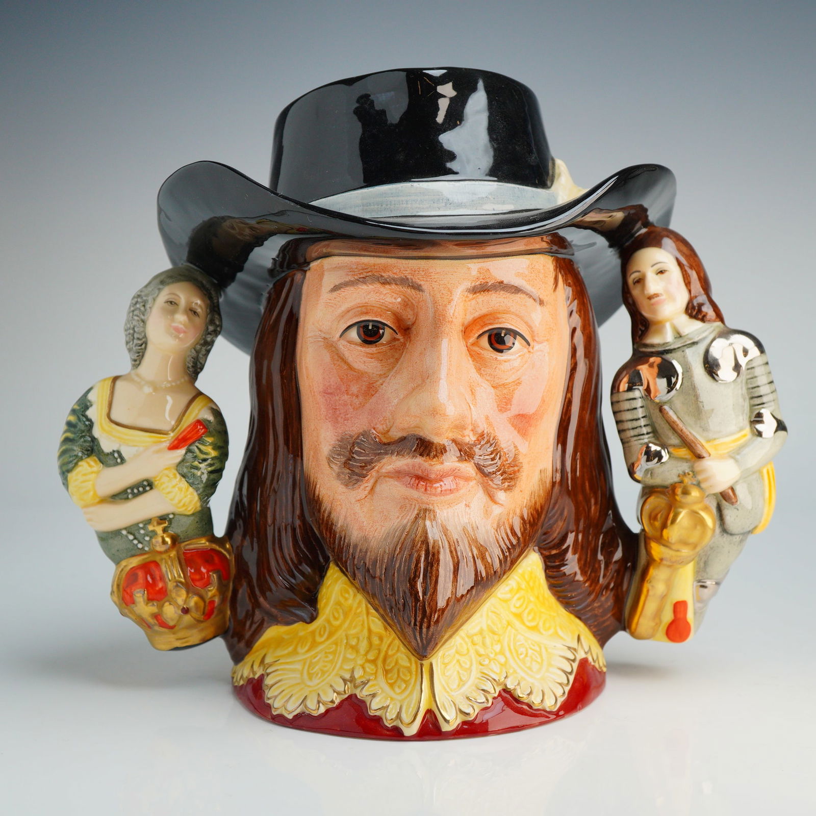 Royal Doulton Large Character Jug, King Charles I D6917: This large-scale ceramic jug was modeled by William K. Harper and issued in 1992 to commemorate the 350th anniversary of the start of the English Civil War. The hand-decorated piece features a central