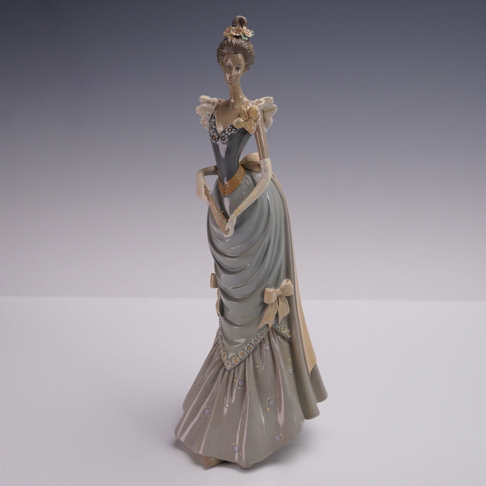 Figurine of a Woman with a Fan (1 of 4)