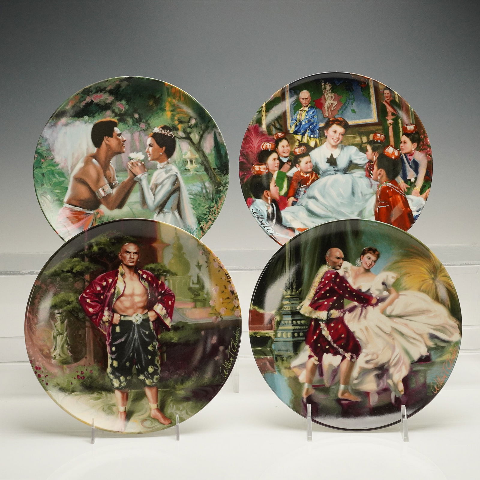 4pc Edwin M. Knowles King and I Plates by William Chambers: A 4-piece set of collectible fine china plates from the King and I series, each painted by artist William Chambers and released by Edwin M. Knowles in 1985. These 8.5" plates commemorate the legendary
