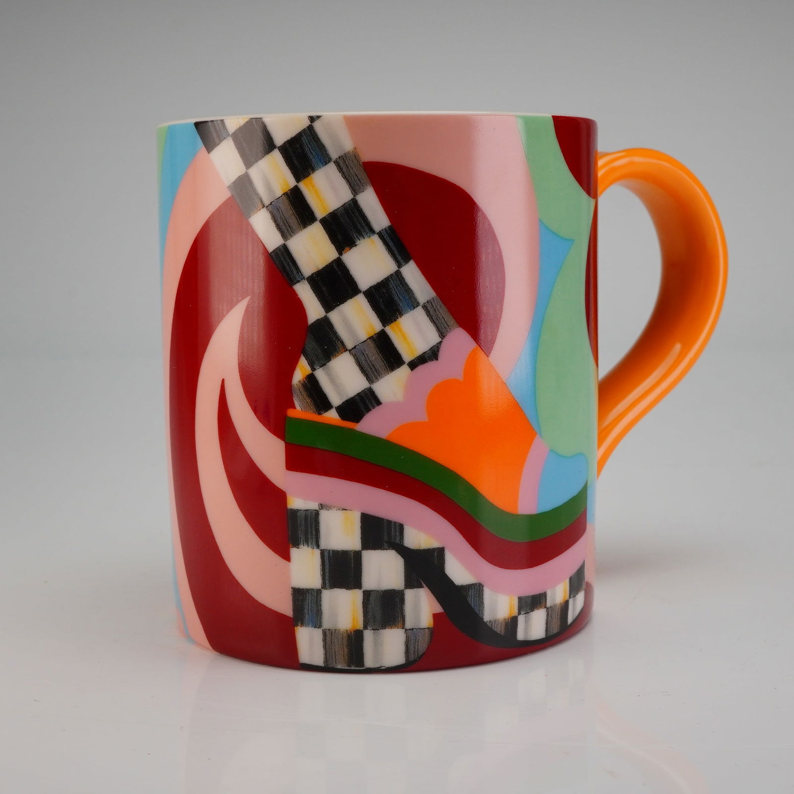 MacKenzie Childs Artist Mug by Bijou Karman: The mug features a vibrant, multi-color Postmodern Pop Art-style decoration. The exterior is covered in swirling abstract patterns utilizing high-saturation colors including red, pink, teal, green, an