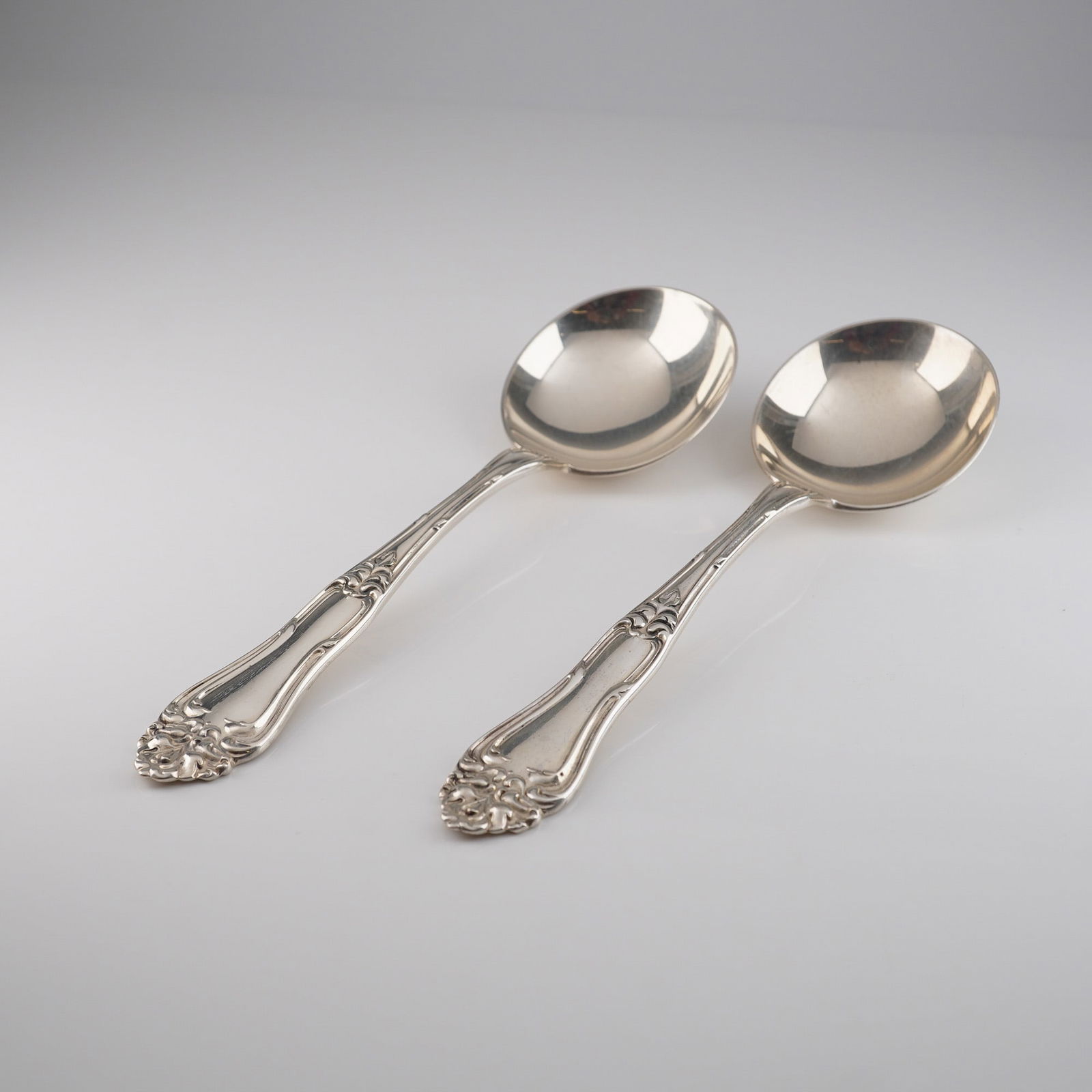 A Pair of Dunston Sterling Silver Rococo Revival Soup Spoons (1 of 4)