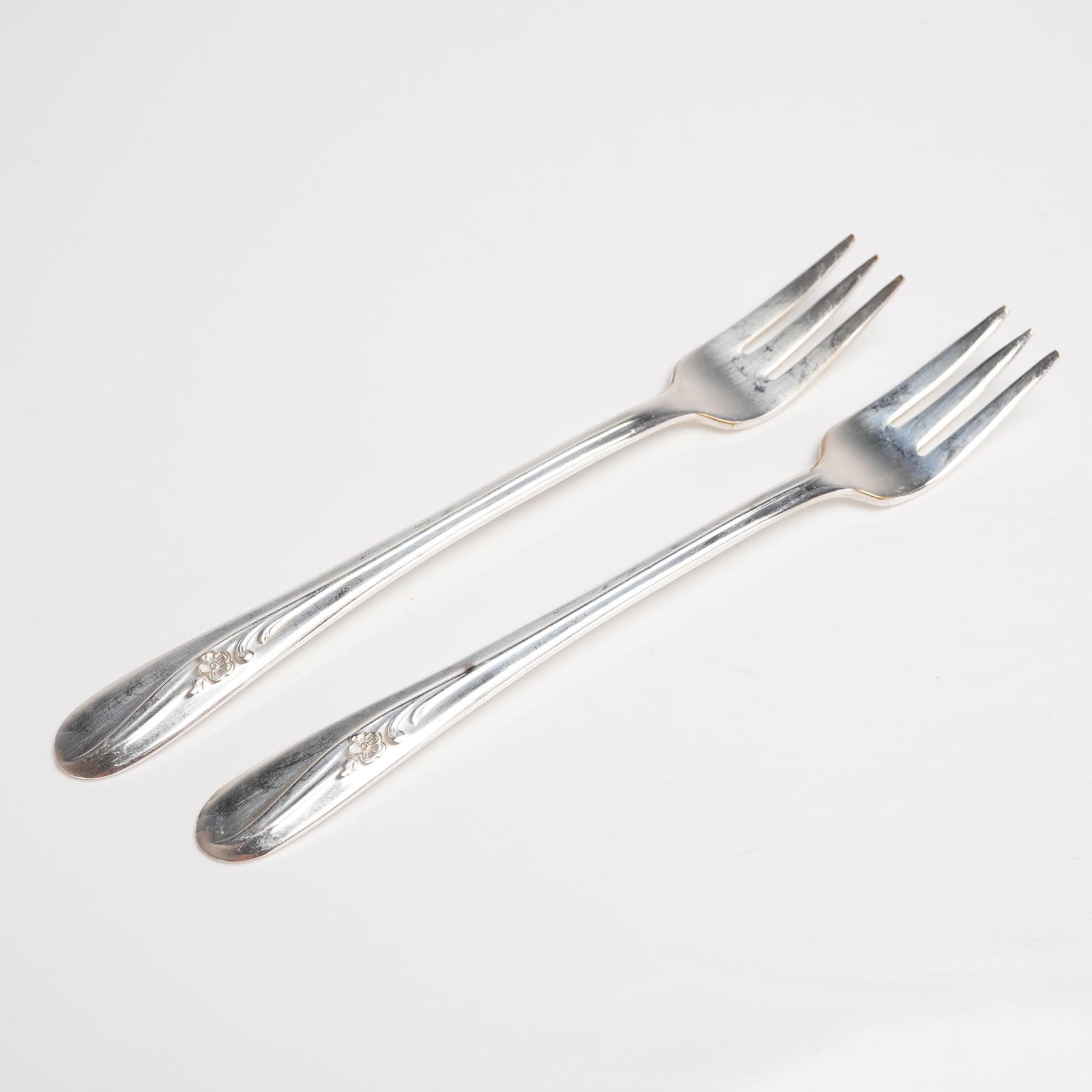 A Pair of H. & T. MFG. CO. Meadow Flower Silverplate Dessert Forks (1 of 4)