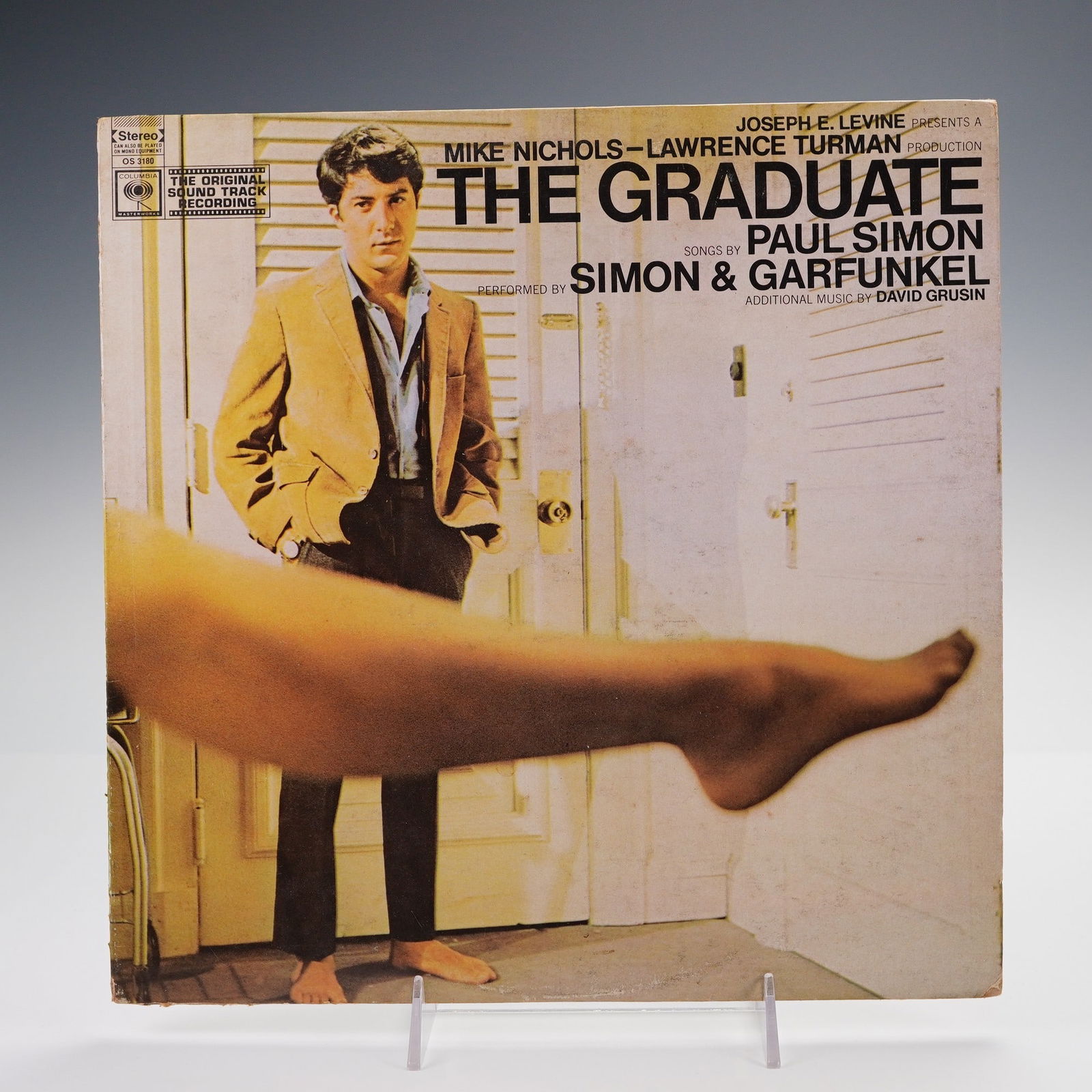 Columbia Records Simon & Garfunkel Vinyl Record, The Graduate: This 12-inch vinyl record presents the original motion picture soundtrack for the 1967 Academy Award-winning film The Graduate, directed by Mike Nichols and produced by Lawrence Turman, featuring a ce