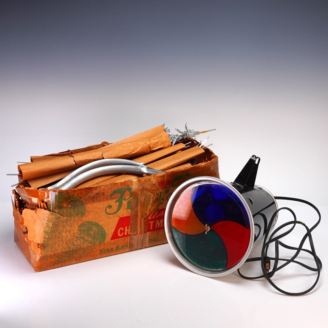 2pc Star Band Sparkler Pom-Pom Aluminum Christmas Tree with Color Projector: Collection includes a mid-century modern "Sparkler Pom-Pom" aluminum Christmas tree manufactured by Star Band Co., Inc., accompanied by a vintage revolving color wheel projector. The tree features sil