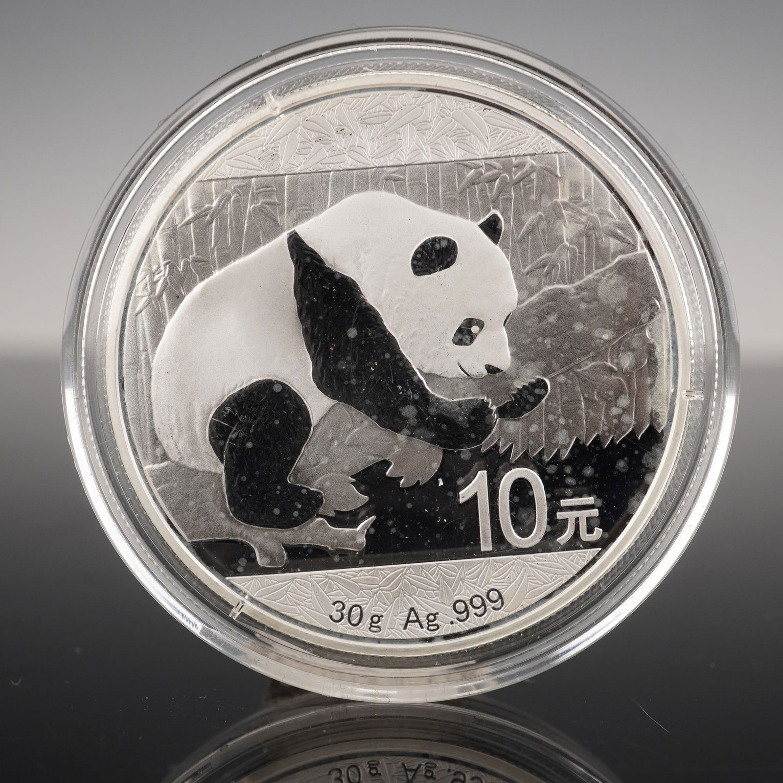 2016 China Panda 10 Yuan Silver Coin: A 2016 China Silver Panda 10 Yuan coin struck in 30 grams of .999 fine silver. The obverse displays the Temple of Heaven in Beijing encircled by Chinese inscriptions with the year of issue below. The