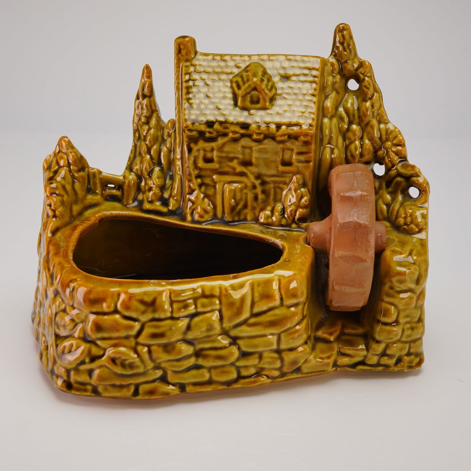 Shawnee Pottery Grist Mill Planter Model 769: A single figural glazed ceramic planter, identified through consensus research as the Shawnee Pottery Grist Mill Planter, model number 769, dating to the mid-20th century, circa 1950s. The earthenware