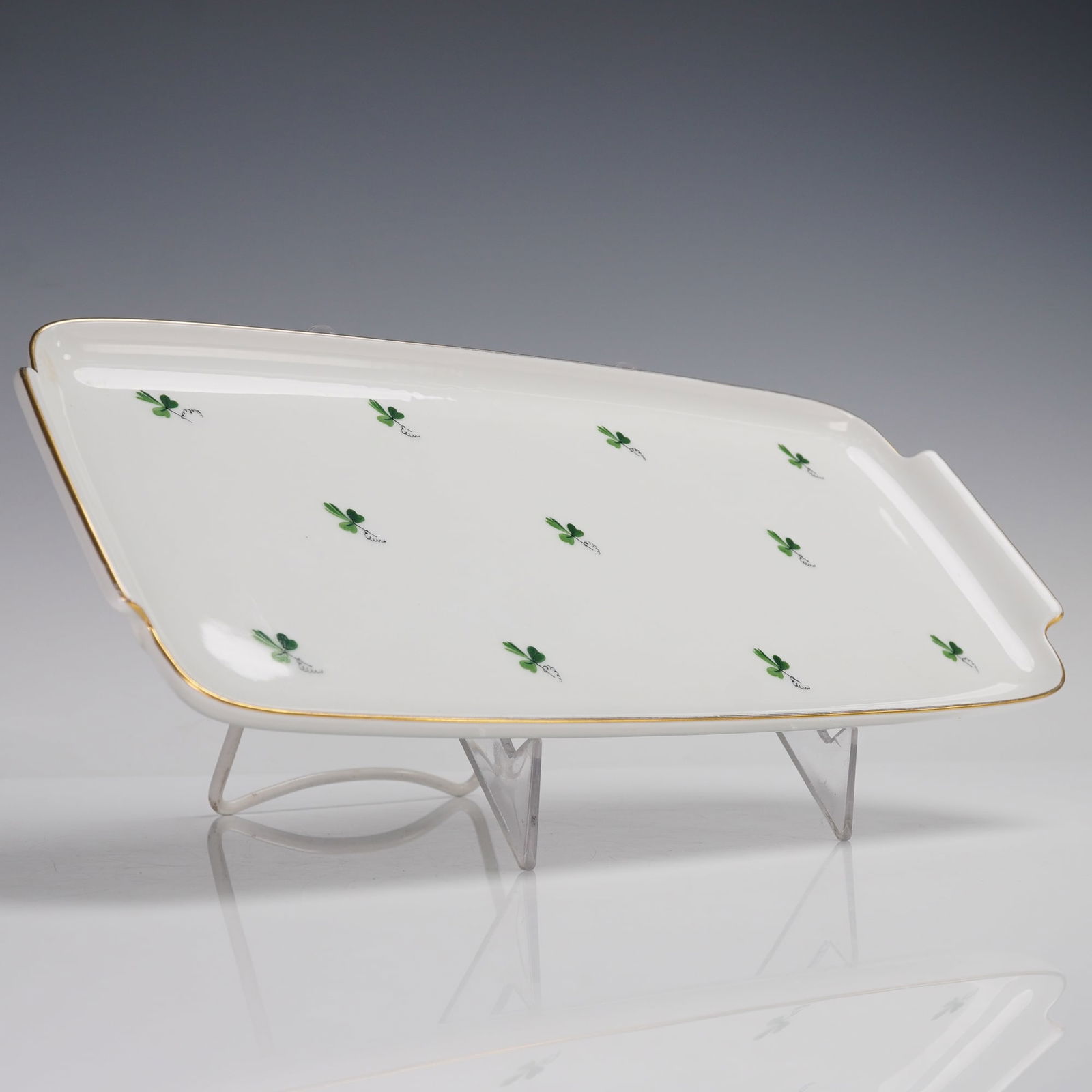 Augarten Wien Porcelain Serving Platter: An Austrian porcelain rectangular tray by Augarten Wien, decorated with scattered green clover motifs and trimmed in gilt. Marked on the underside 6490 Wien and Made in Austria. The classic Augarten