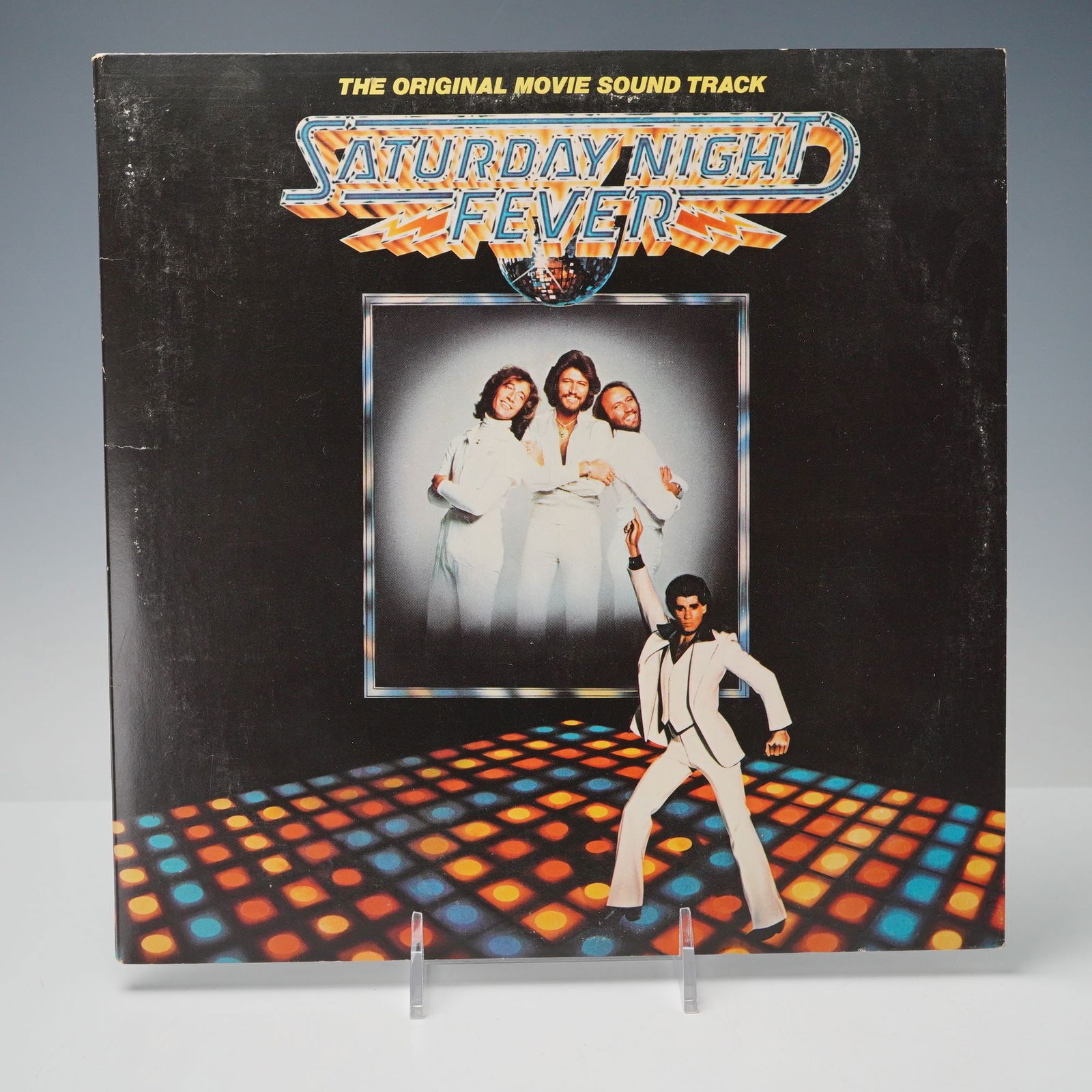 Bee Gees Vinyl Record Saturday Night Fever Original Movie Soundtrack: This is the original movie soundtrack from Saturday Night Fever featuring iconic disco hits by the Bee Gees including Stayin Alive How Deep Is Your Love and Night Fever. The album also features perfor