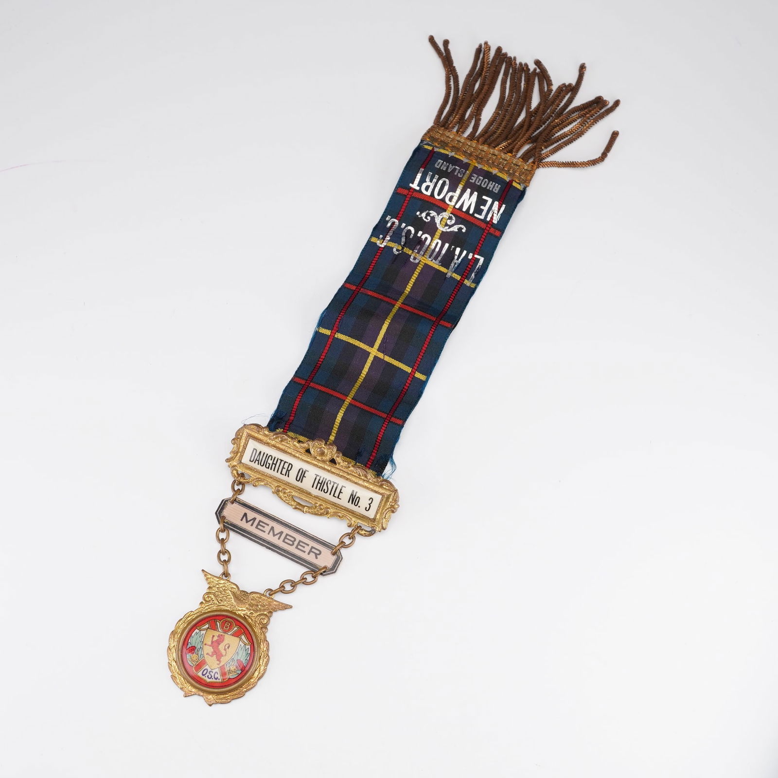 Daughter of Thistle No. 3 Newport Rhode Island Fraternal Ribbon Badge: Vintage fraternal ribbon badge represents the Daughter of Thistle No. 3 chapter of the L.A.T.O.O.S.C. organization in Newport, Rhode Island. The piece features a tartan-patterned silk ribbon with meta