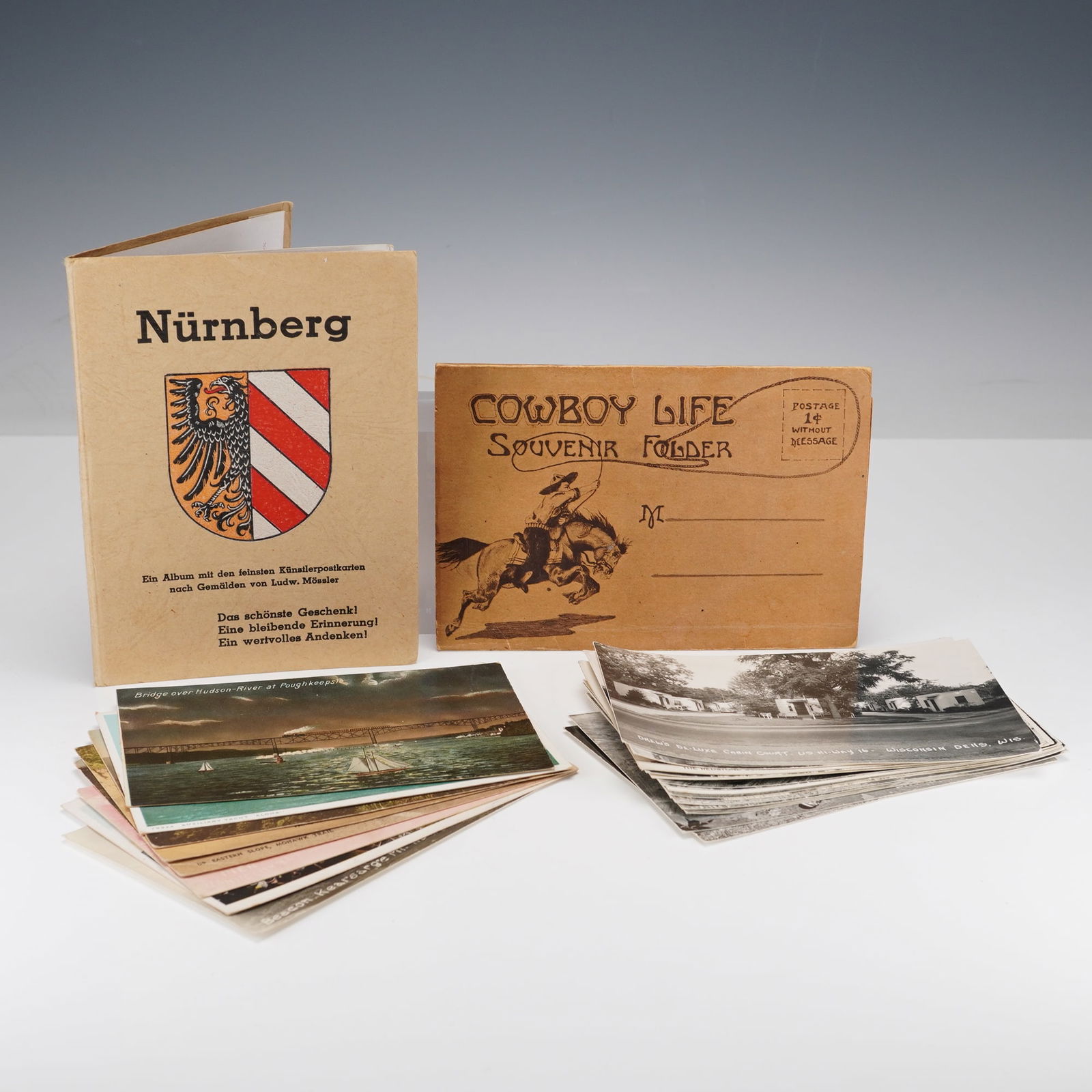 Collection of Vintage Postcards and Souvenir Folders: Group of early to mid-20th-century postcards and souvenir folders, including an illustrated album featuring views after paintings by Ludwig Meister, and a "Cowboy Life" souvenir folder depicting scene