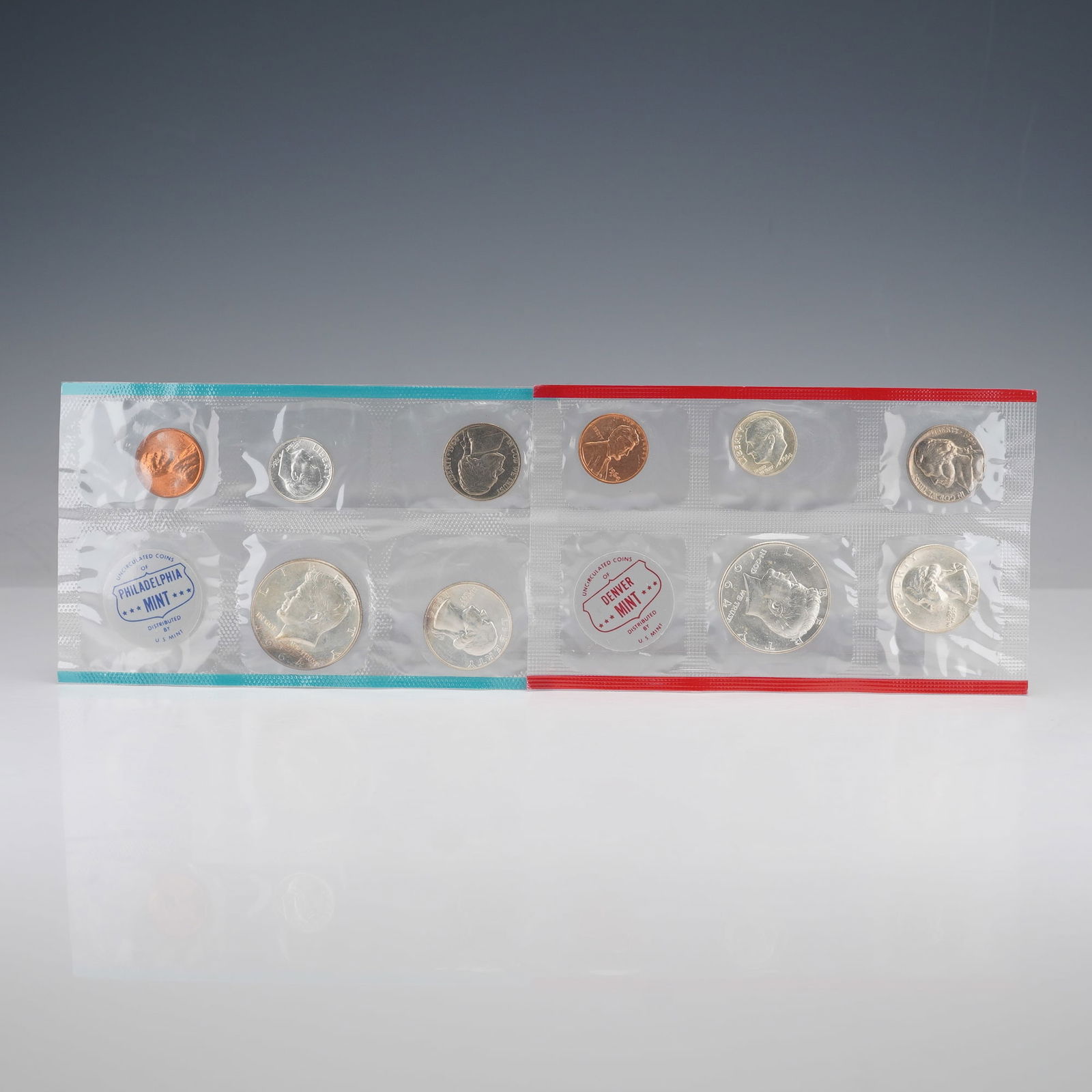 2pc 1964 United States Mint Proof Coin Sets: This 1964 United States Mint Uncirculated Coin Set comprises two sealed panels representing both the Philadelphia and Denver Mints. Each set contains five coins; the Lincoln cent, Jefferson nickel, Ro