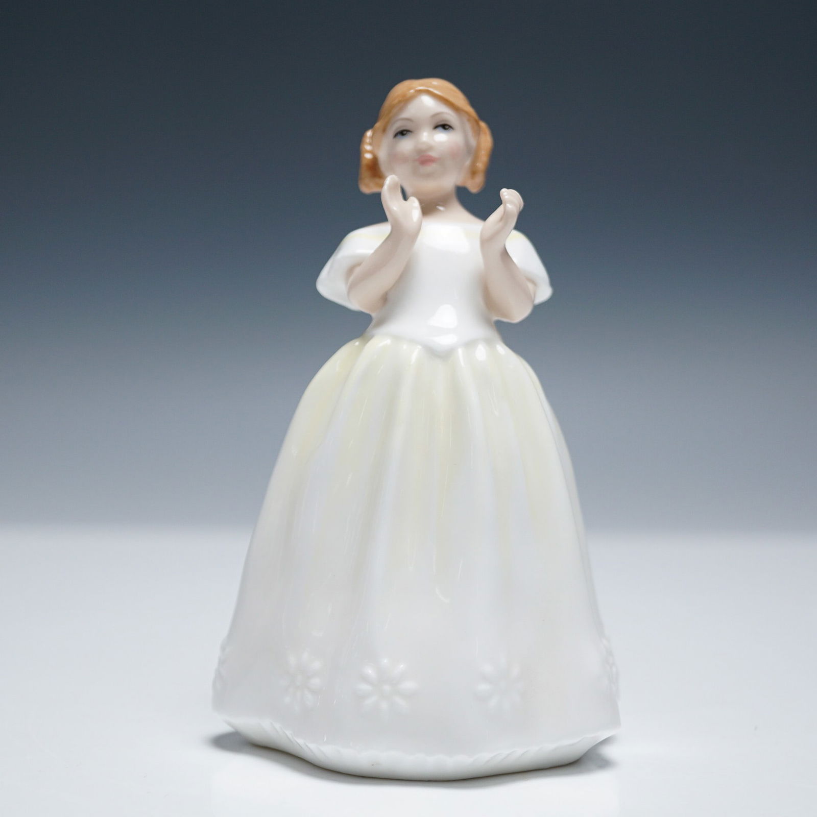 Catherine HN3451 - Royal Doulton Figurine: Royal Doulton porcelain figurine titled Catherine, model HN3451, designed by Pauline Parsons. Originally issued in 1984, this particular example is from the 1993 New Colourway release. The piece