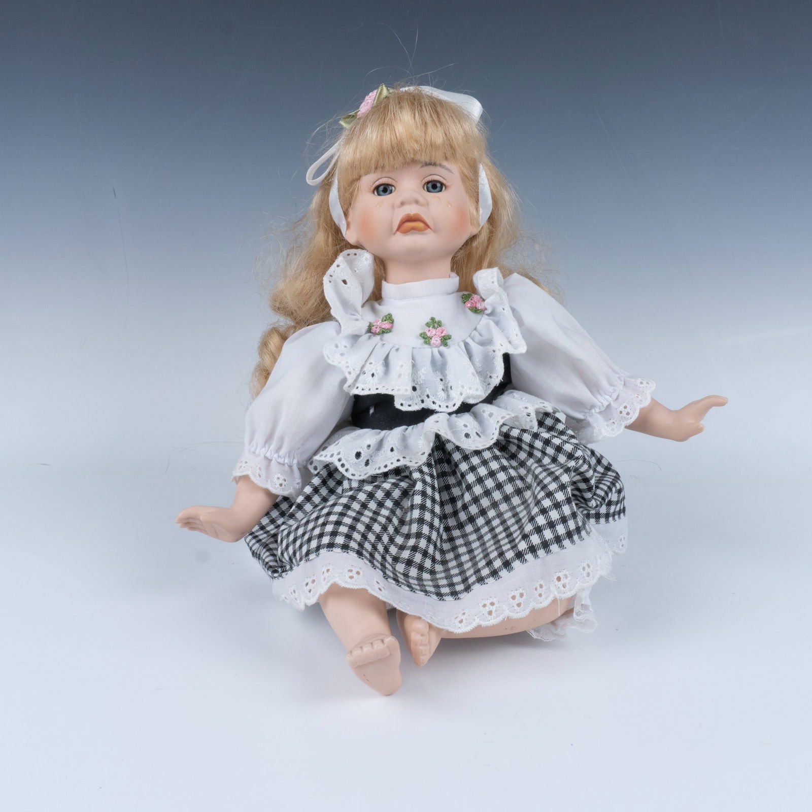 Crying Porcelain Sitting Doll (1 of 5)