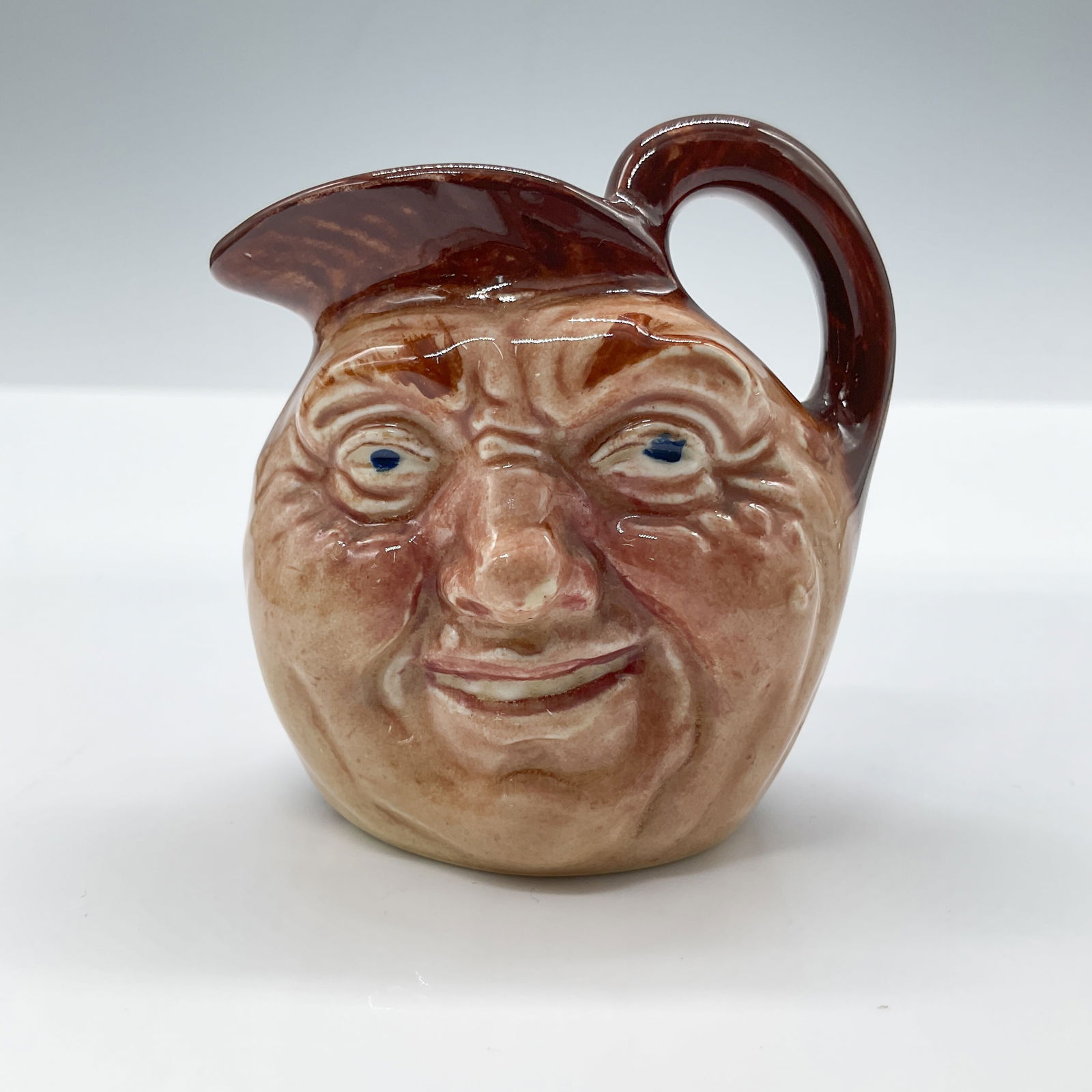 John Barleycorn D6041 - Mini - Royal Doulton Character Jug: Inside handle. Royal Doulton backstamp. Artist: Charles J. Noke Issued: Unknown Dimensions: 2.5"H Country of Origin: England