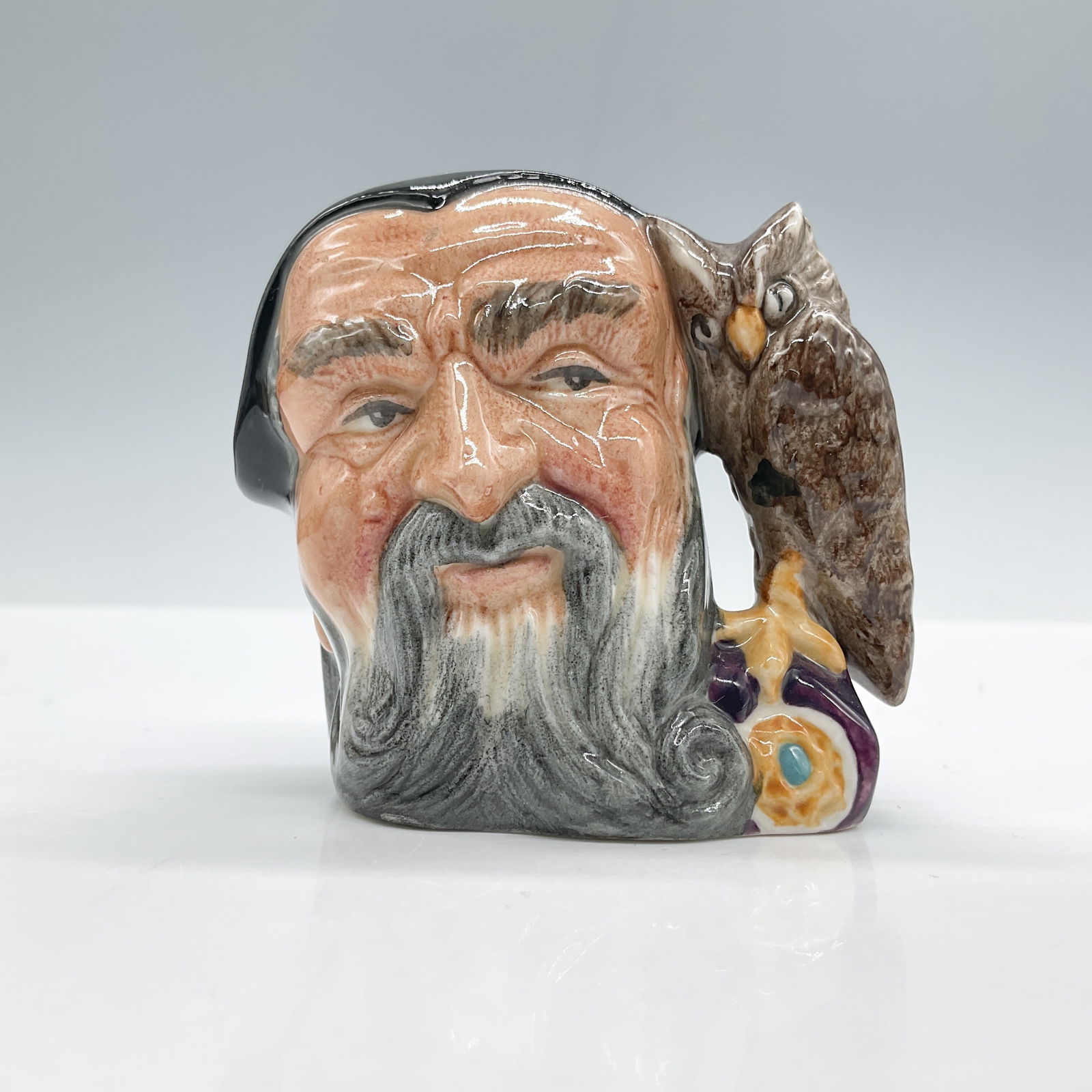 Merlin D6543 - Mini - Royal Doulton Character Jug: Royal Doulton backstamp. Artist: Garry Sharpe Issued: 1960 - 1991 Dimensions: 2.75"H Country of Origin: England